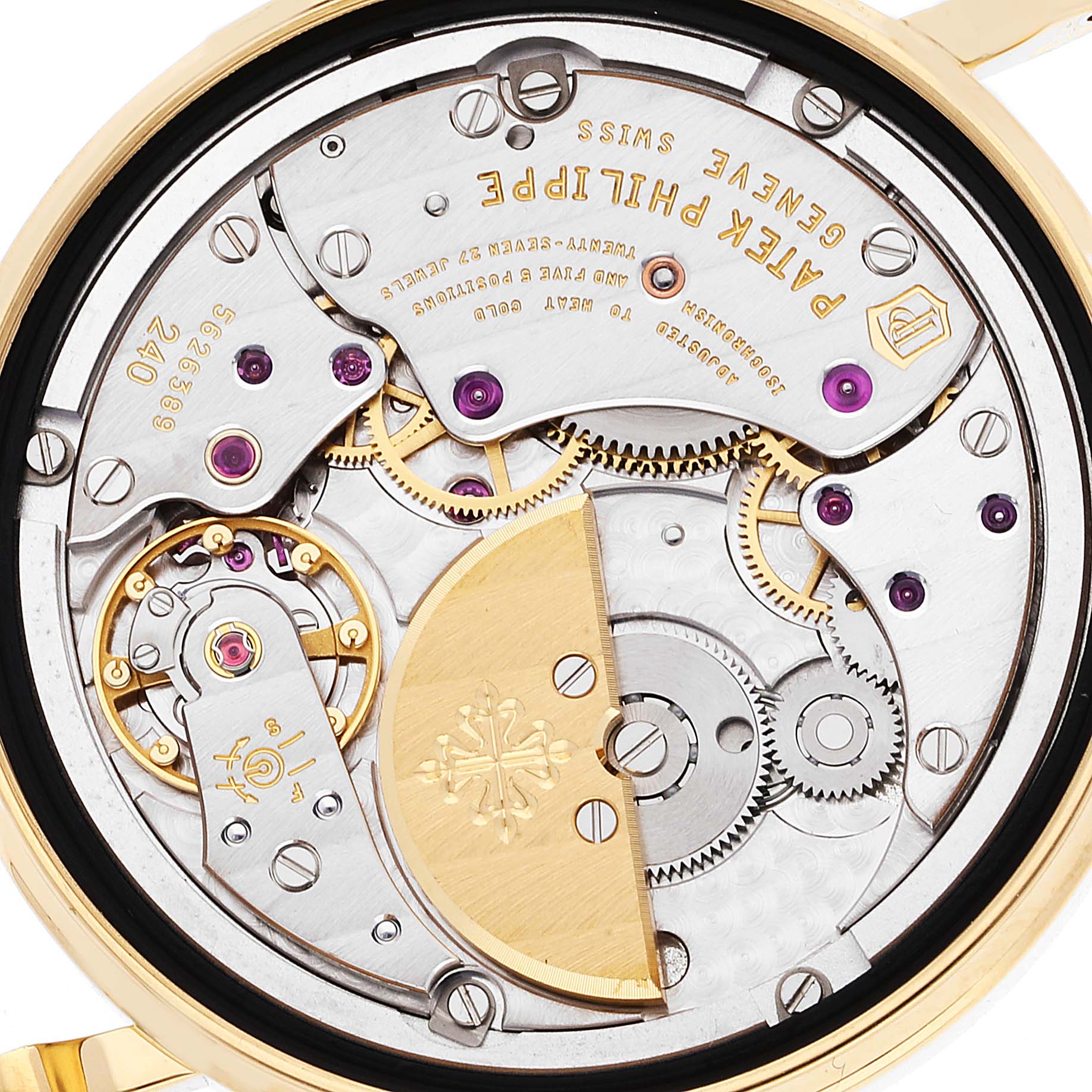 The image shows the internal mechanism of a Patek Philippe Calatrava 5120J Men's Yellow Gold White Dial 5120J Men's Yellow Gold White Dial watch from a rear angle.