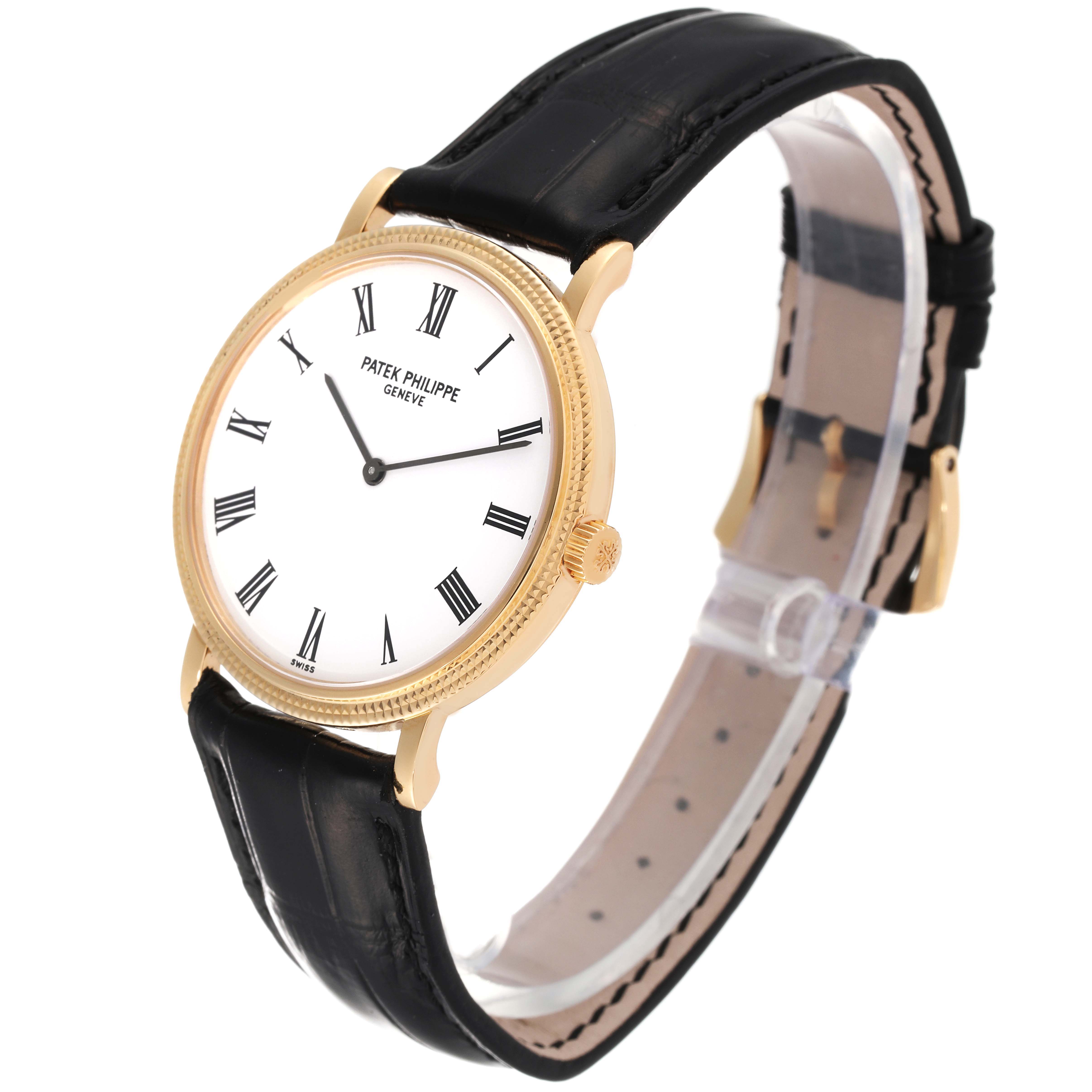 The Patek Philippe Calatrava 5120J Men's Yellow Gold White Dial 5120J Men's Yellow Gold White Dial watch is shown at a slight angle, highlighting its round dial, leather strap, and gold casing.