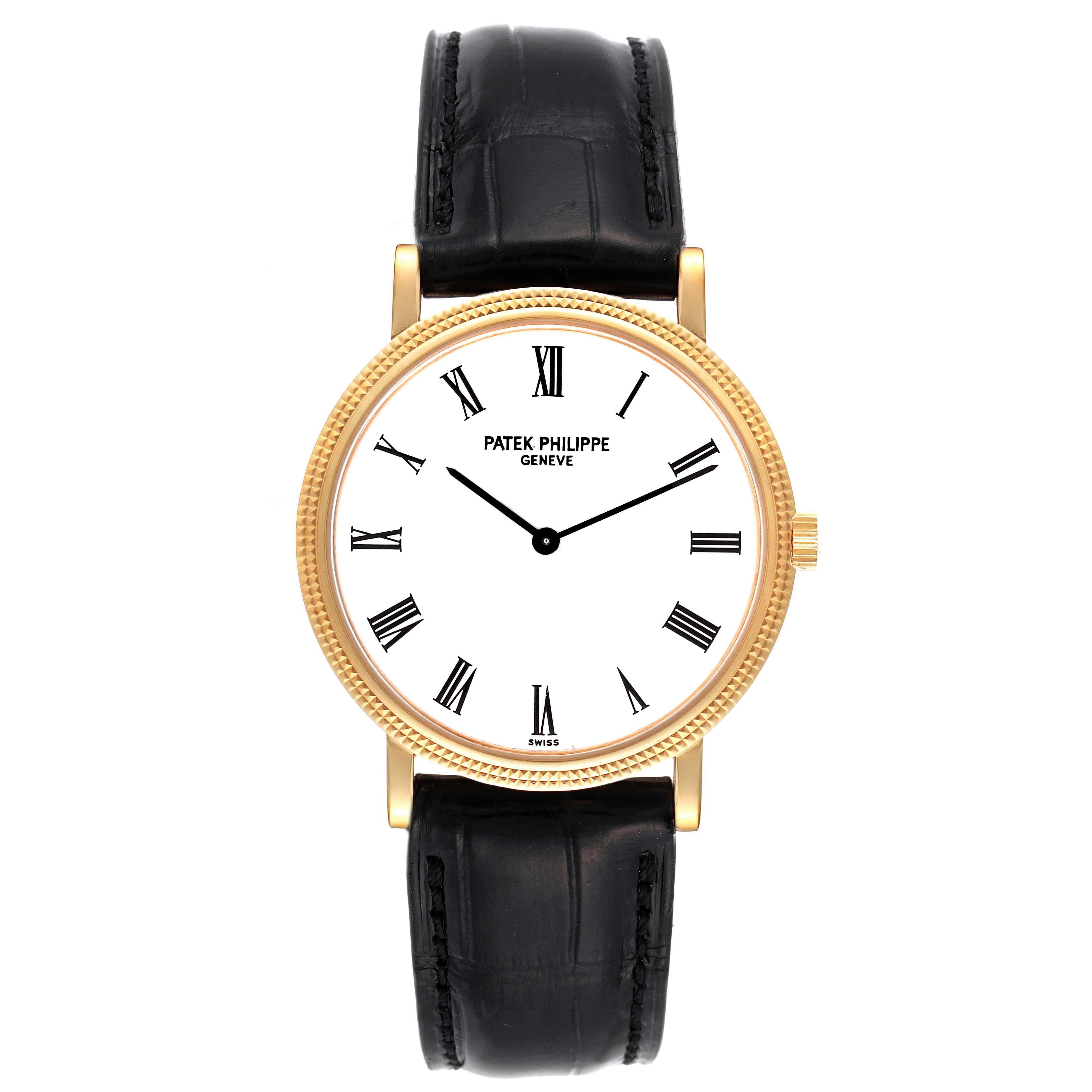 The image shows a frontal view of a Patek Philippe Calatrava 5120J Men's Yellow Gold White Dial 5120J Men's Yellow Gold White Dial watch with a white dial and black leather strap.