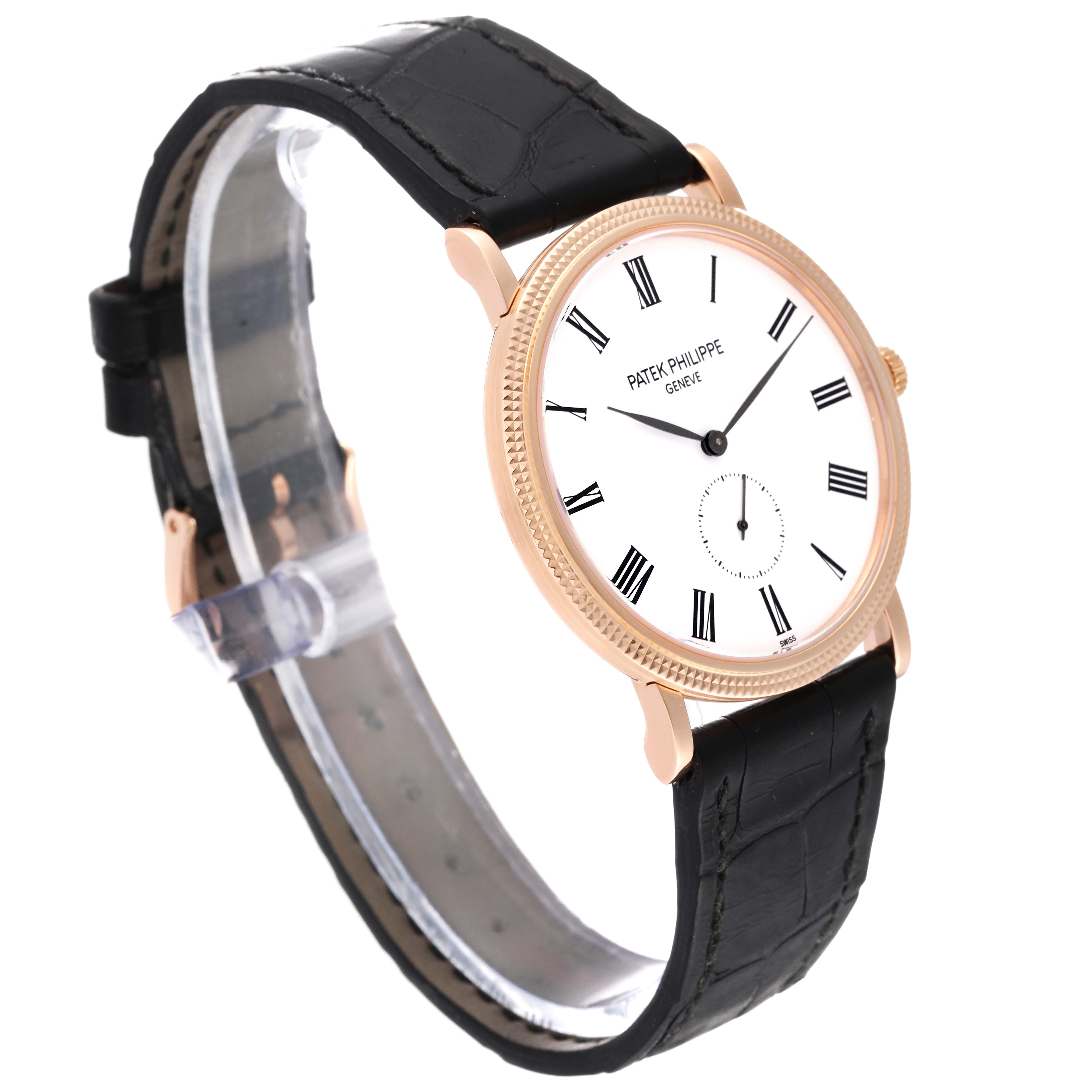 The image shows a Patek Philippe Calatrava 5119R-001 Men's Rose Gold White Dial 5119R-001 Men's Rose Gold White Dial watch at a three-quarter angle, highlighting the dial, bezel, and leather strap.