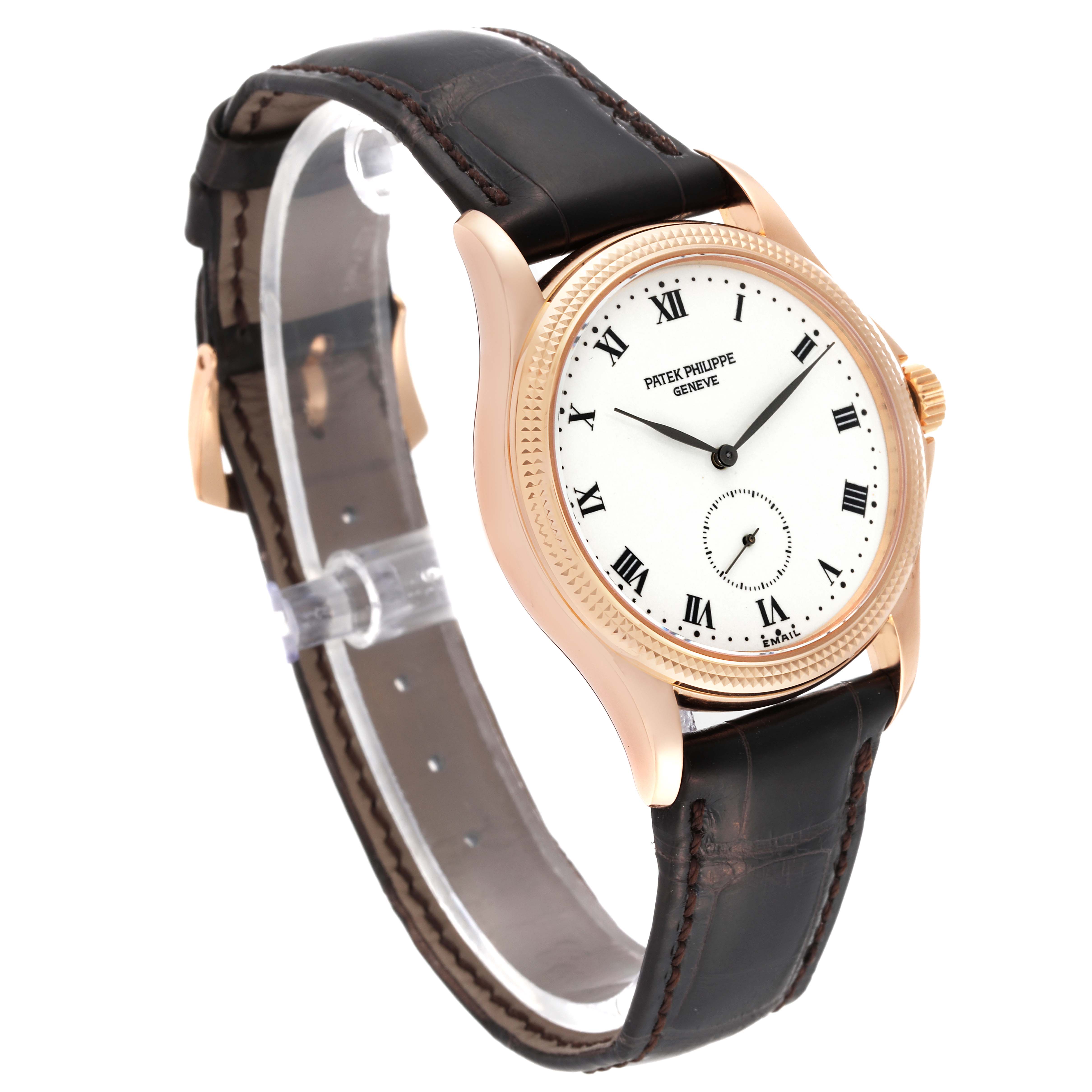 The image shows a Patek Philippe Calatrava 5115R-001 Men
s Rose Gold White Dial 5115R-001 Men
s Rose Gold White Dial watch in a three-quarter angle, highlighting its face, dial, and leather strap.