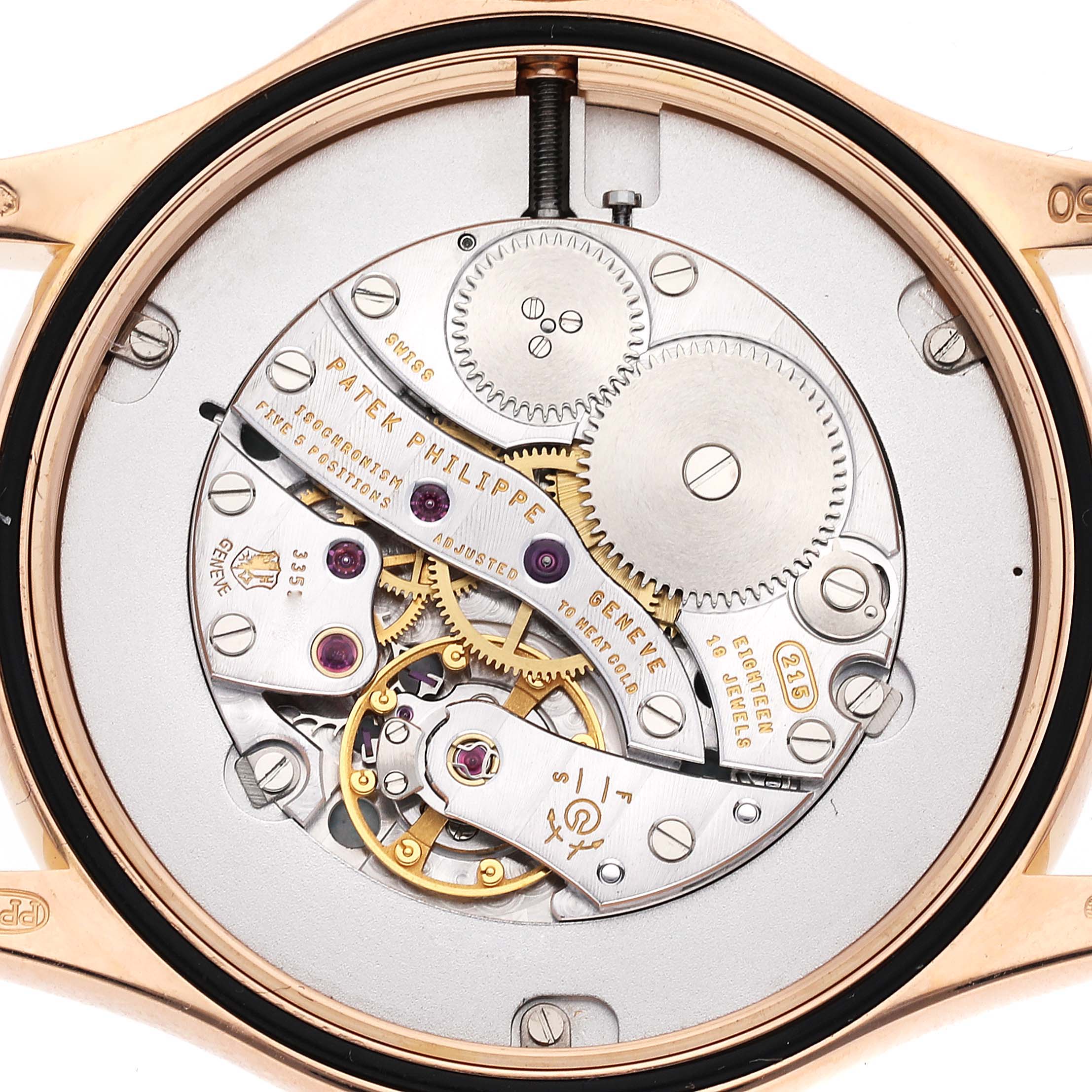 The image shows the movement mechanism of a Patek Philippe Calatrava 5115R-001 Men
s Rose Gold White Dial 5115R-001 Men
s Rose Gold White Dial model from a top-down angle.