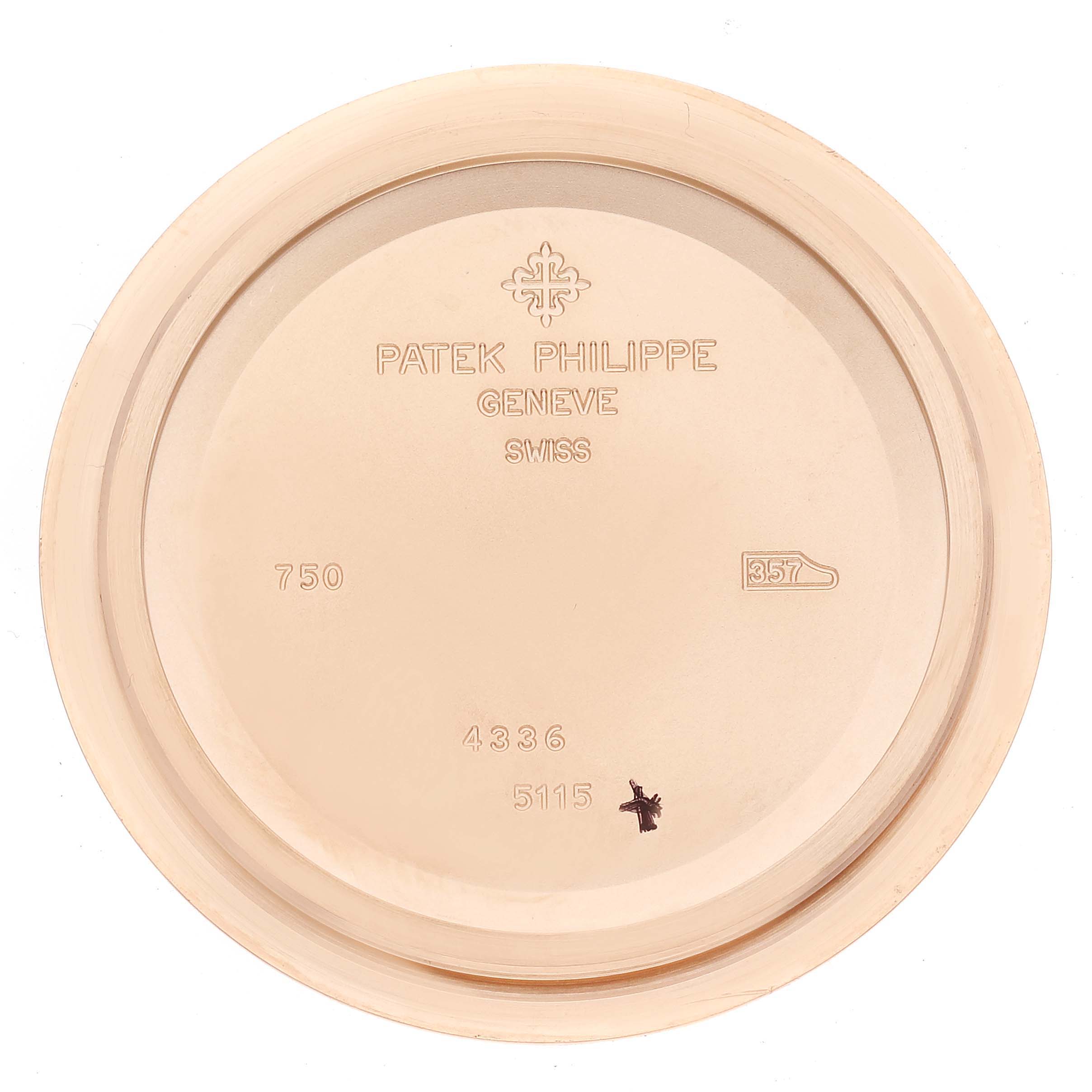 This image shows the inside case back of a Patek Philippe Calatrava 5115R-001 Men
s Rose Gold White Dial 5115R-001 Men
s Rose Gold White Dial watch, featuring engraved details.