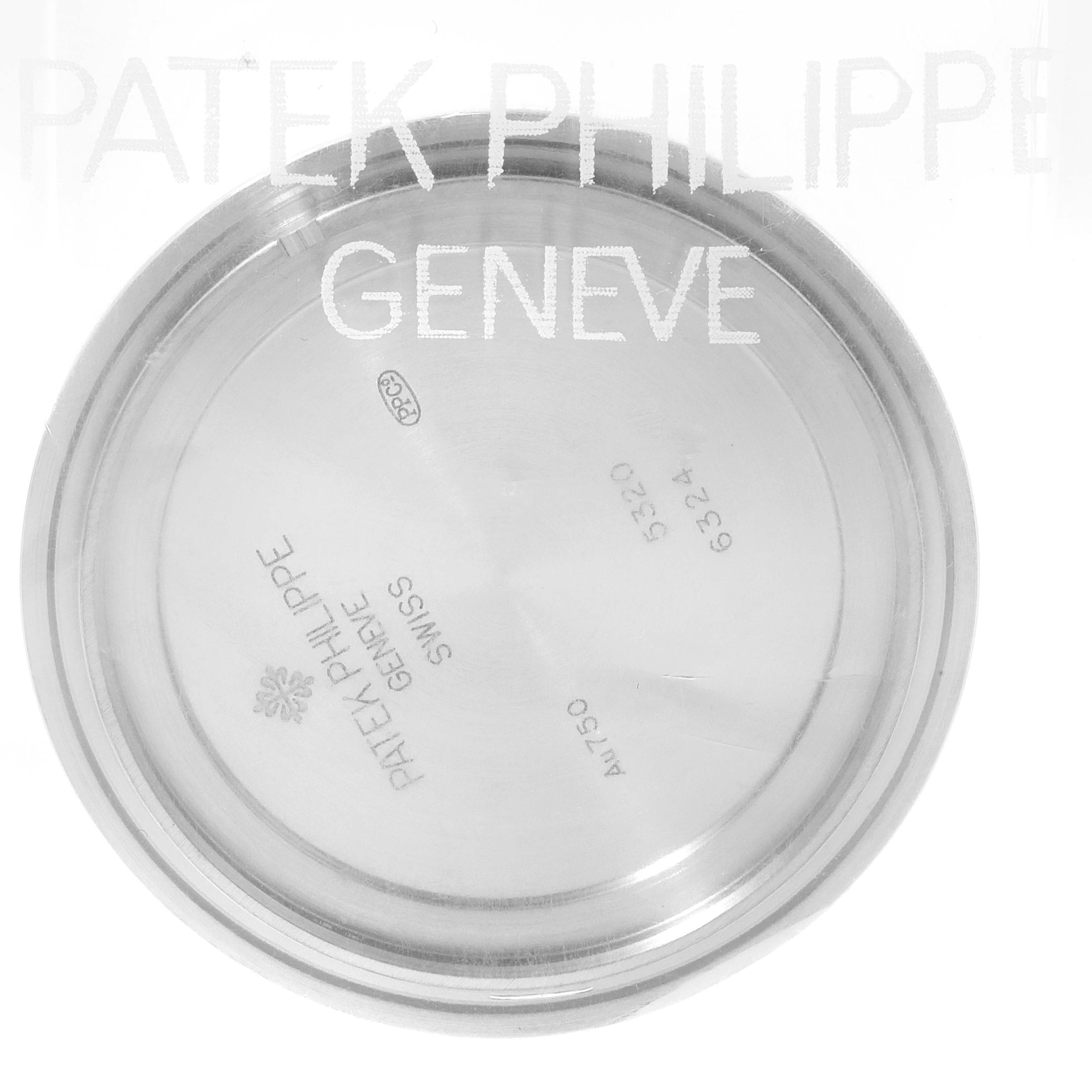 This image shows the interior case back of a Patek Philippe Complications 5320G-001 Men's White Gold Beige Dial 5320G-001 Men's White Gold Beige Dial model, with inscriptions and hallmarks visible.