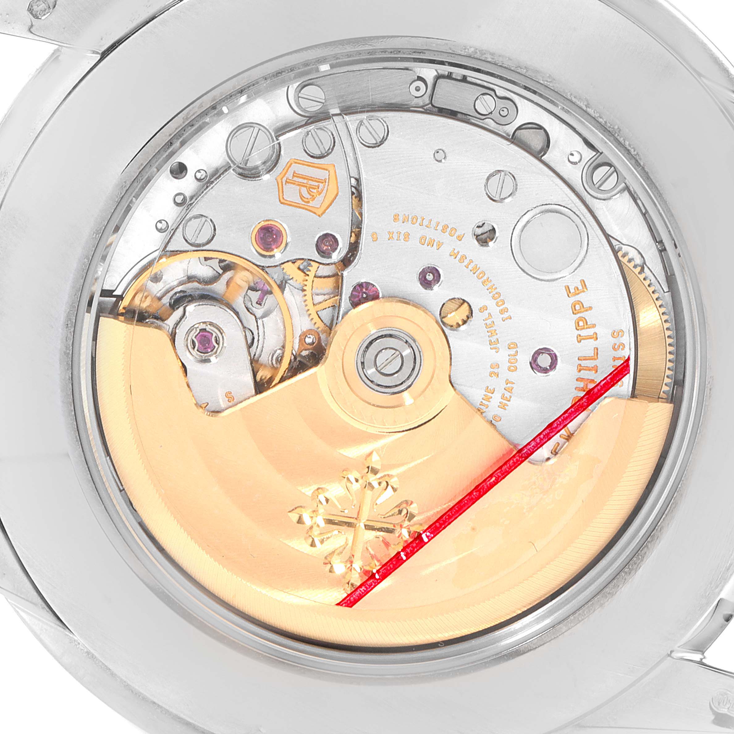 This image shows the back angle of a Patek Philippe Complications 5320G-001 Men's White Gold Beige Dial 5320G-001 Men's White Gold Beige Dial model, highlighting its intricate inner mechanisms and rotor.