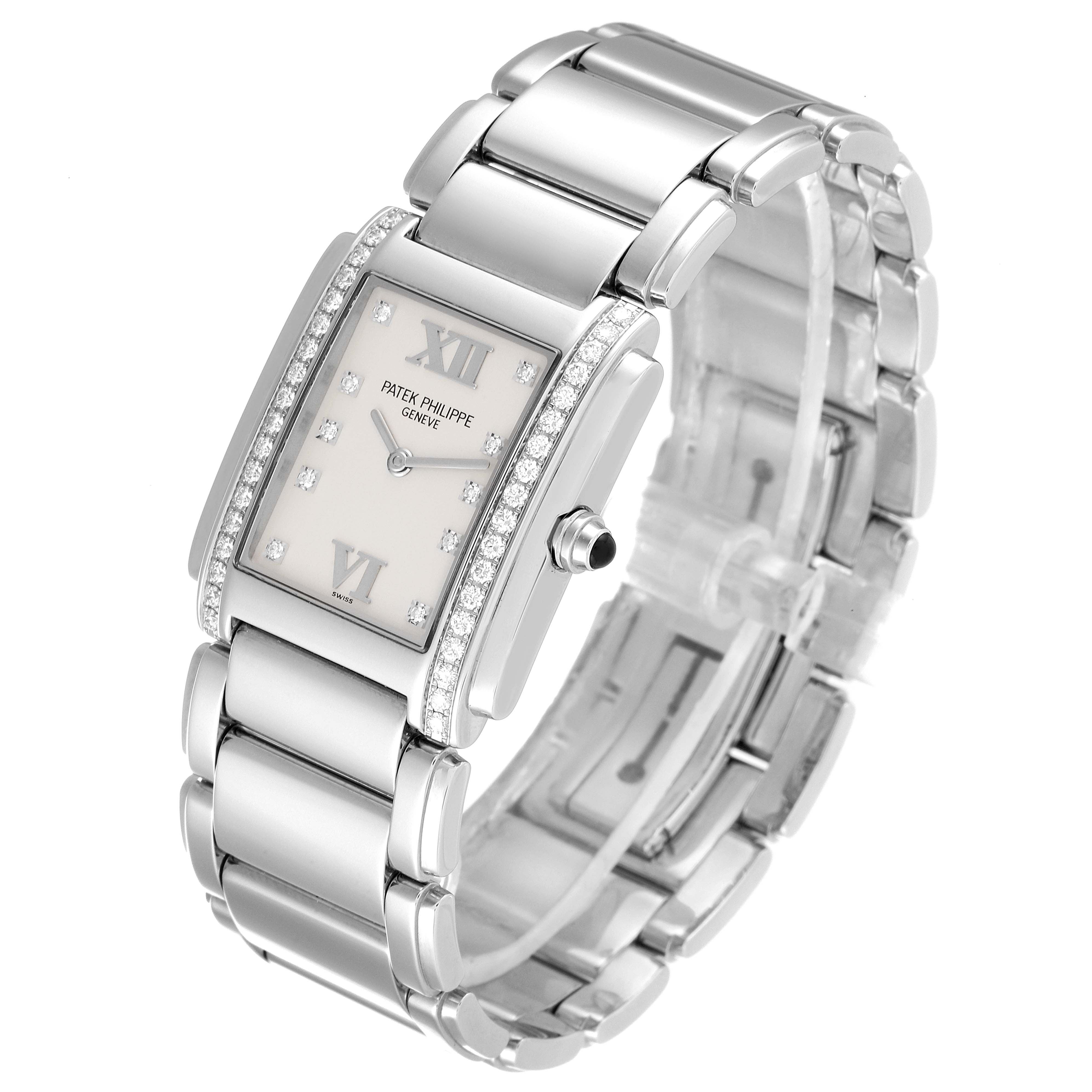 The Patek Philippe Twenty-4 4910/10A-010 Women's Stainless Steel Silver Dial 4910/10A-010 Women's Stainless Steel Silver Dial watch is shown at a three-quarter angle, displaying its bracelet, rectangular dial, and side crown.