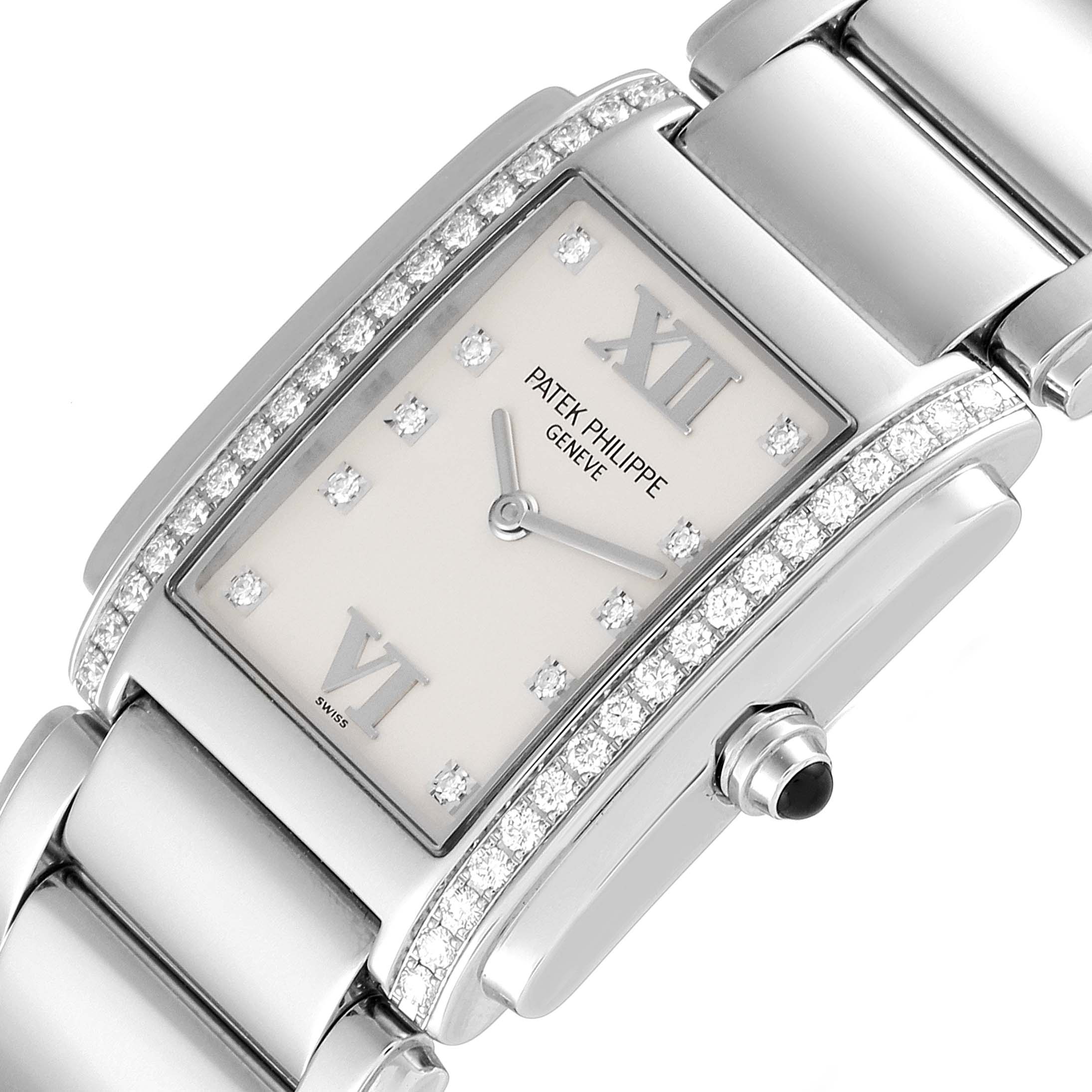 The image shows a close-up angled view of the face and bracelet of a Patek Philippe Twenty-4 4910/10A-010 Women's Stainless Steel Silver Dial 4910/10A-010 Women's Stainless Steel Silver Dial watch, highlighting its diamond accents and dial.