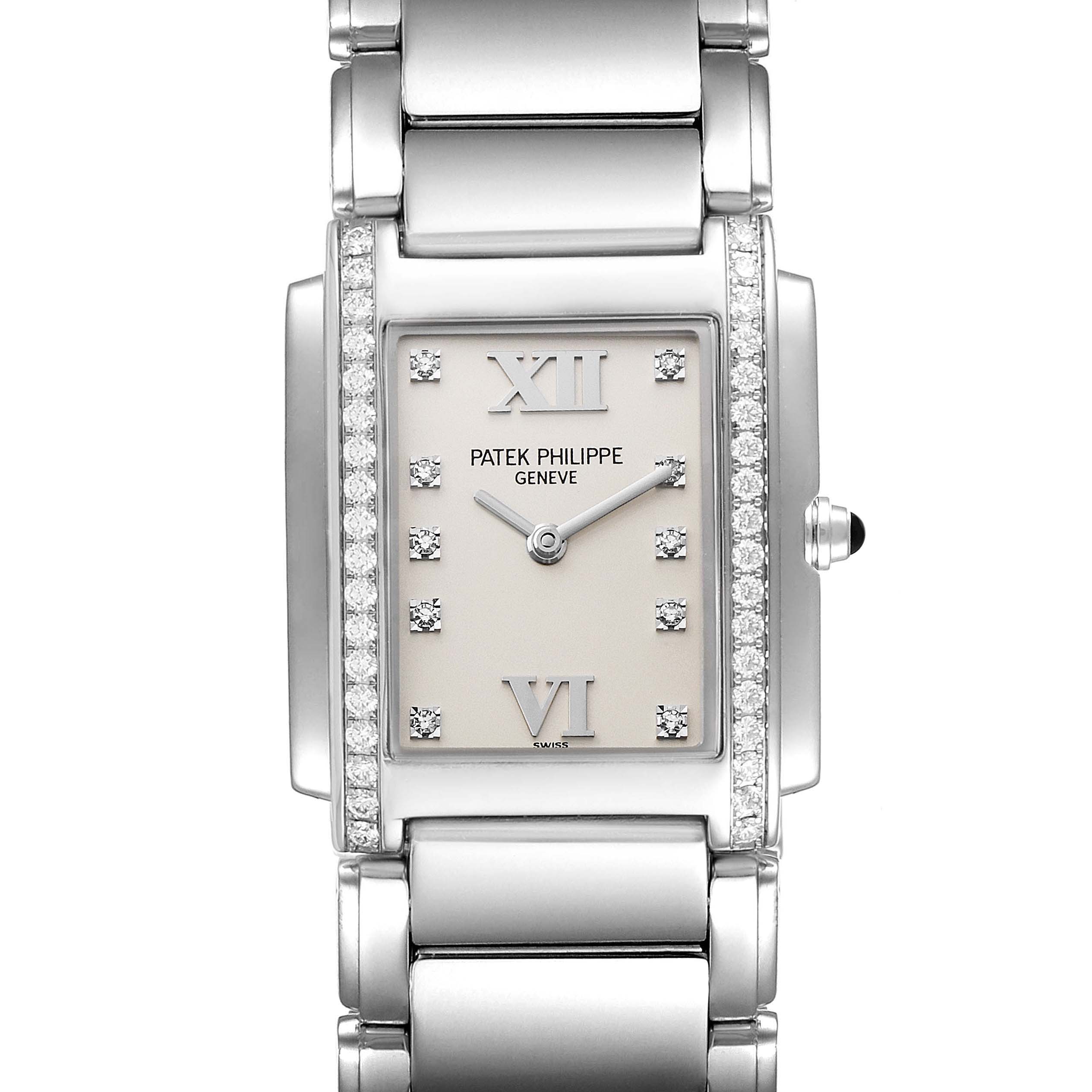 The image shows a frontal view of a Patek Philippe Twenty-4 4910/10A-010 Women's Stainless Steel Silver Dial 4910/10A-010 Women's Stainless Steel Silver Dial watch, highlighting its dial, bracelet, and diamond accents.