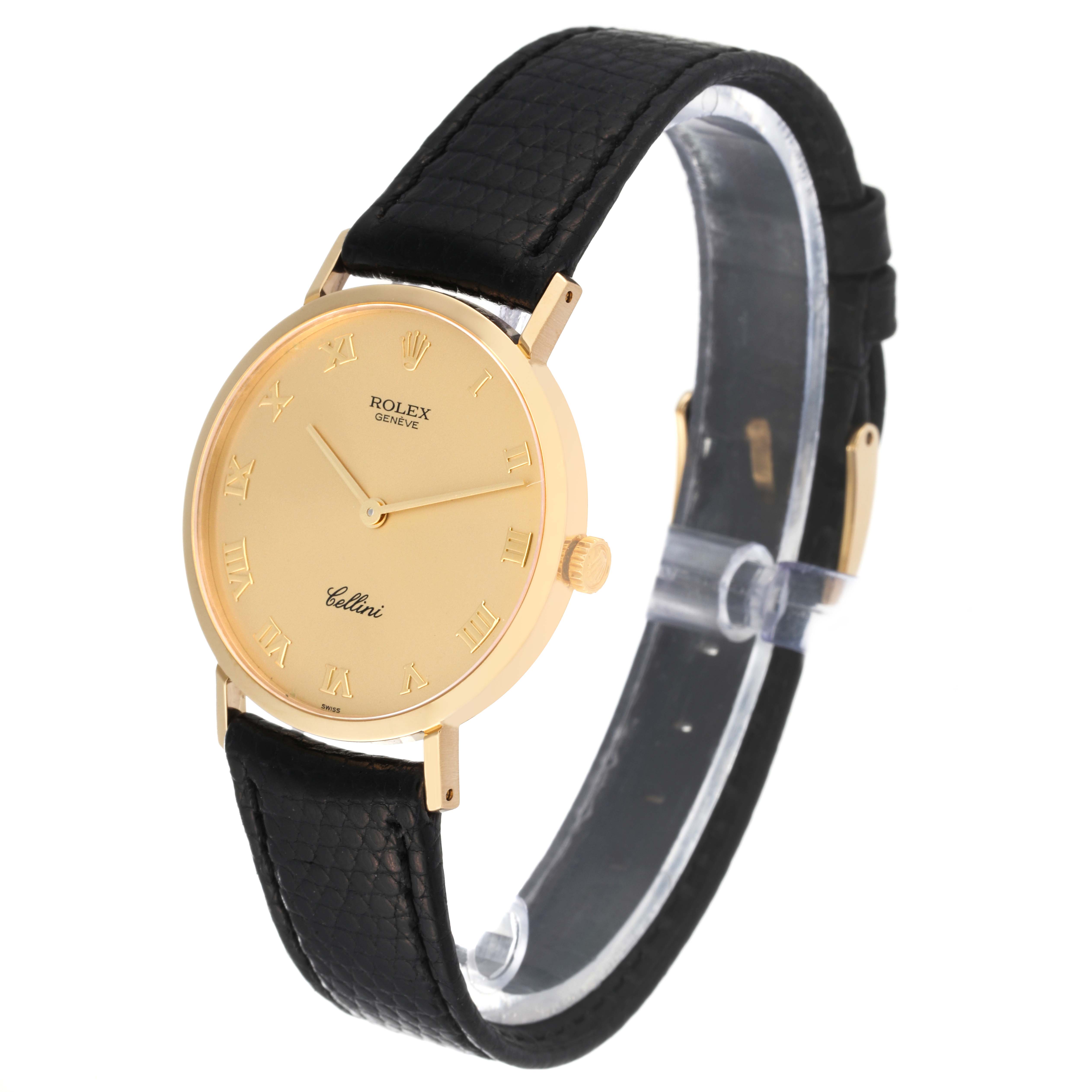 The image shows a side-angle view of a Rolex Cellini 4112 Men's Yellow Gold Champagne Dial 4112 Men's Yellow Gold Champagne Dial watch with a gold dial and black leather strap.