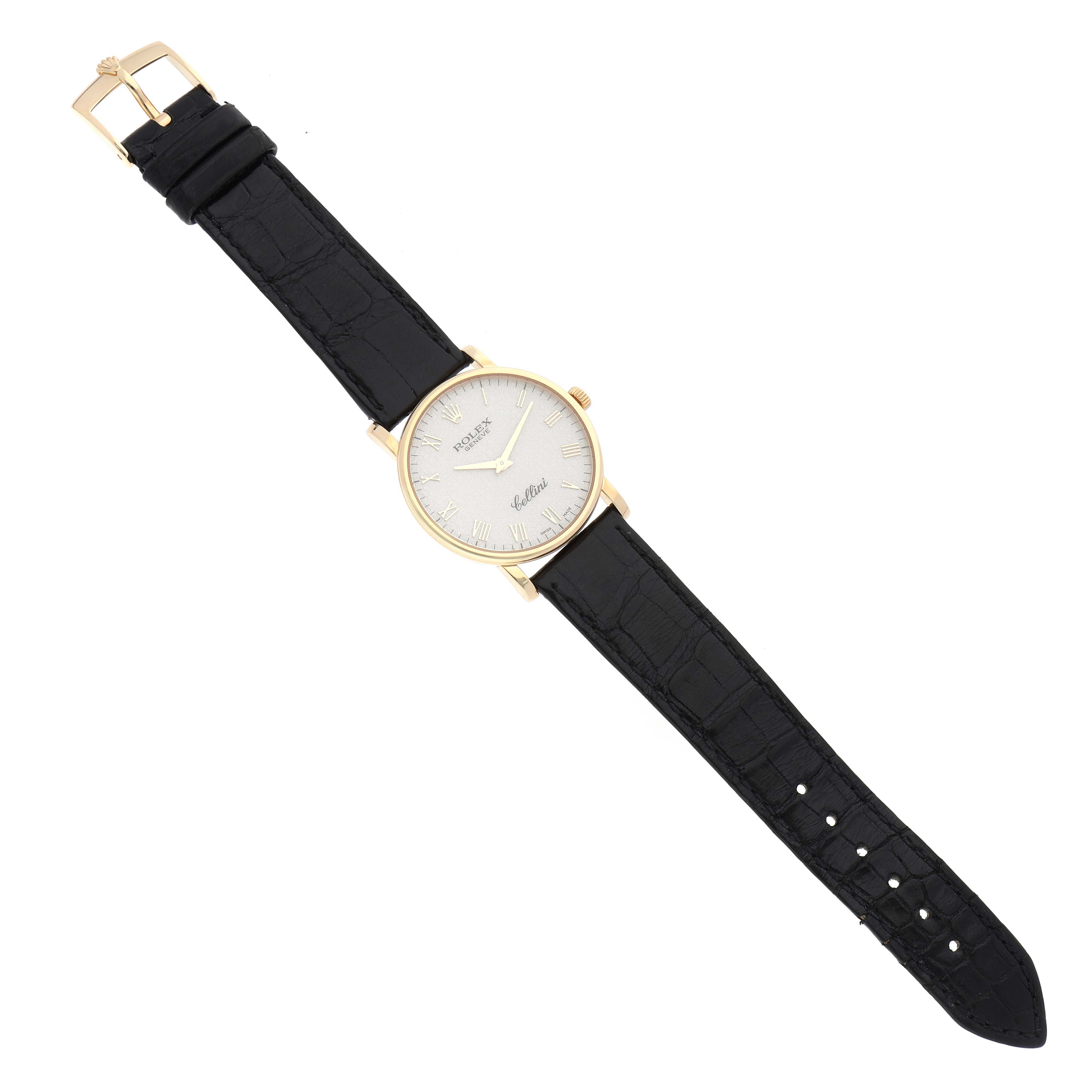 The Rolex Cellini 5115/8 Men's Yellow Gold White Dial 5115/8 Men's Yellow Gold White Dial watch is shown from a top-down angle, highlighting its black leather strap, gold case, and white dial.