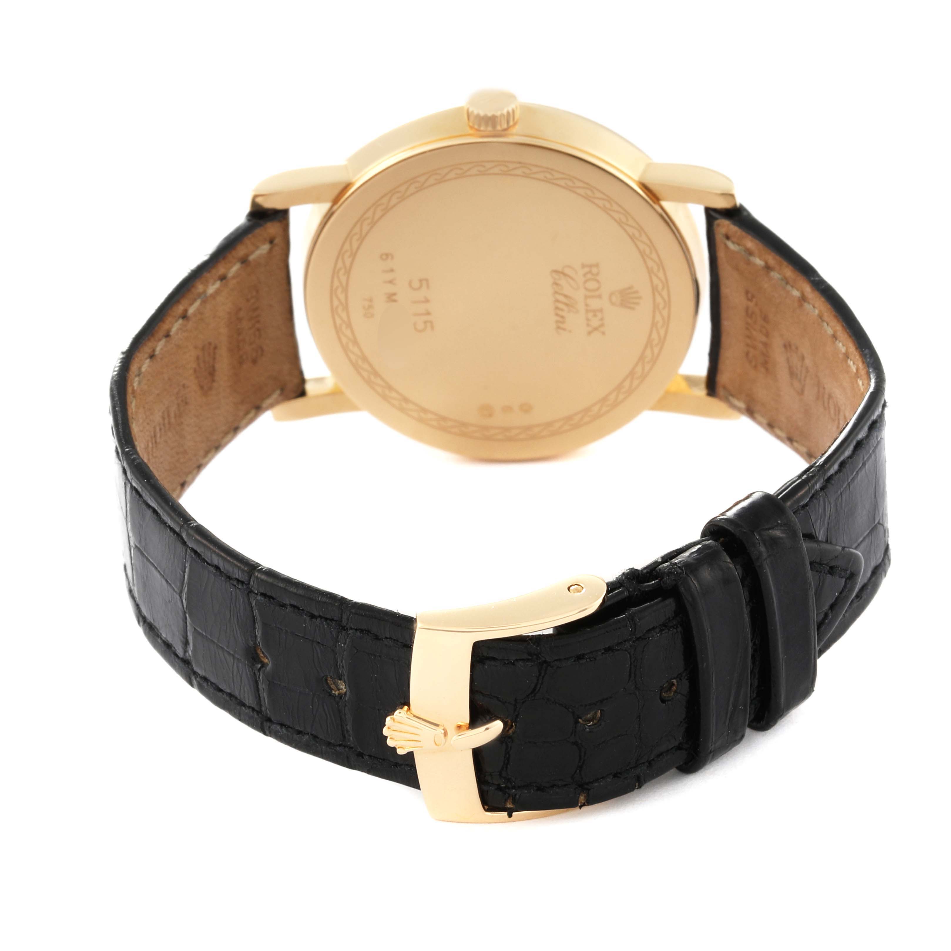 This image shows the back view of a Rolex Cellini 5115/8 Men's Yellow Gold White Dial 5115/8 Men's Yellow Gold White Dial watch, displaying the case back, crown, strap, and clasp.