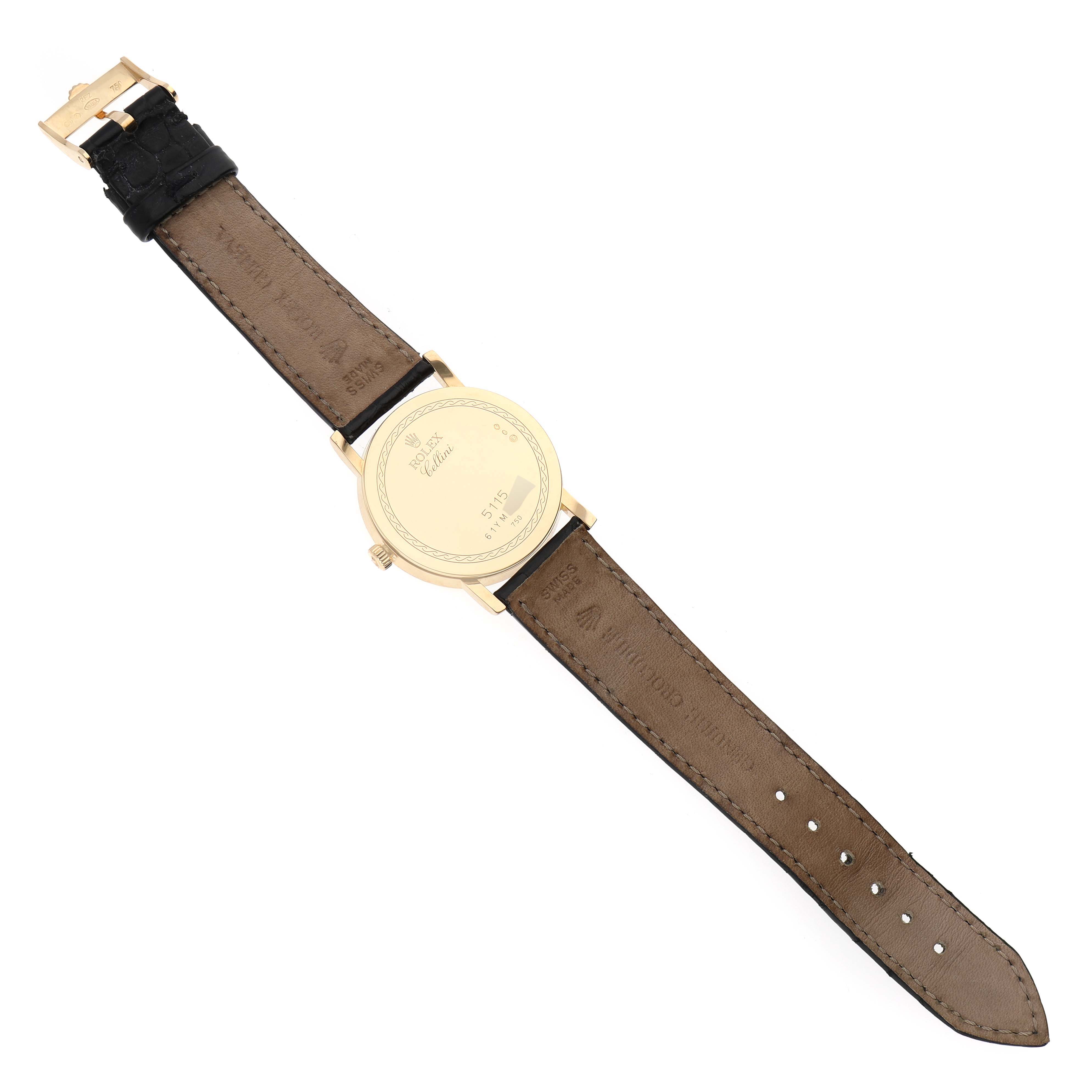 The image shows the back side of the Rolex Cellini 5115/8 Men's Yellow Gold White Dial 5115/8 Men's Yellow Gold White Dial watch with its strap fully extended.