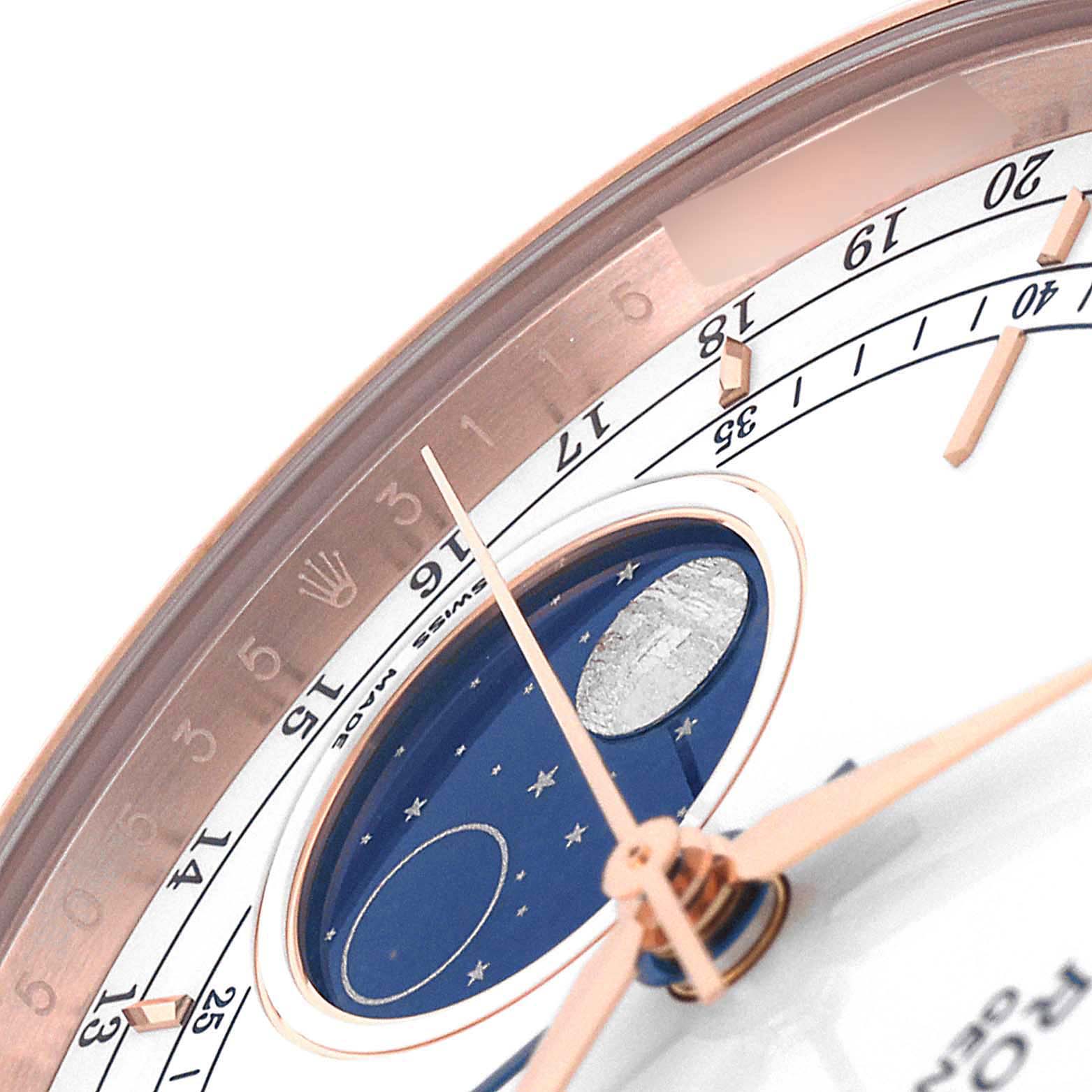 The image shows a close-up of the Rolex Cellini 50535 Men's Rose Gold White Dial 50535 Men's Rose Gold White Dial watch face, highlighting the moon phase display, hands, and indices.