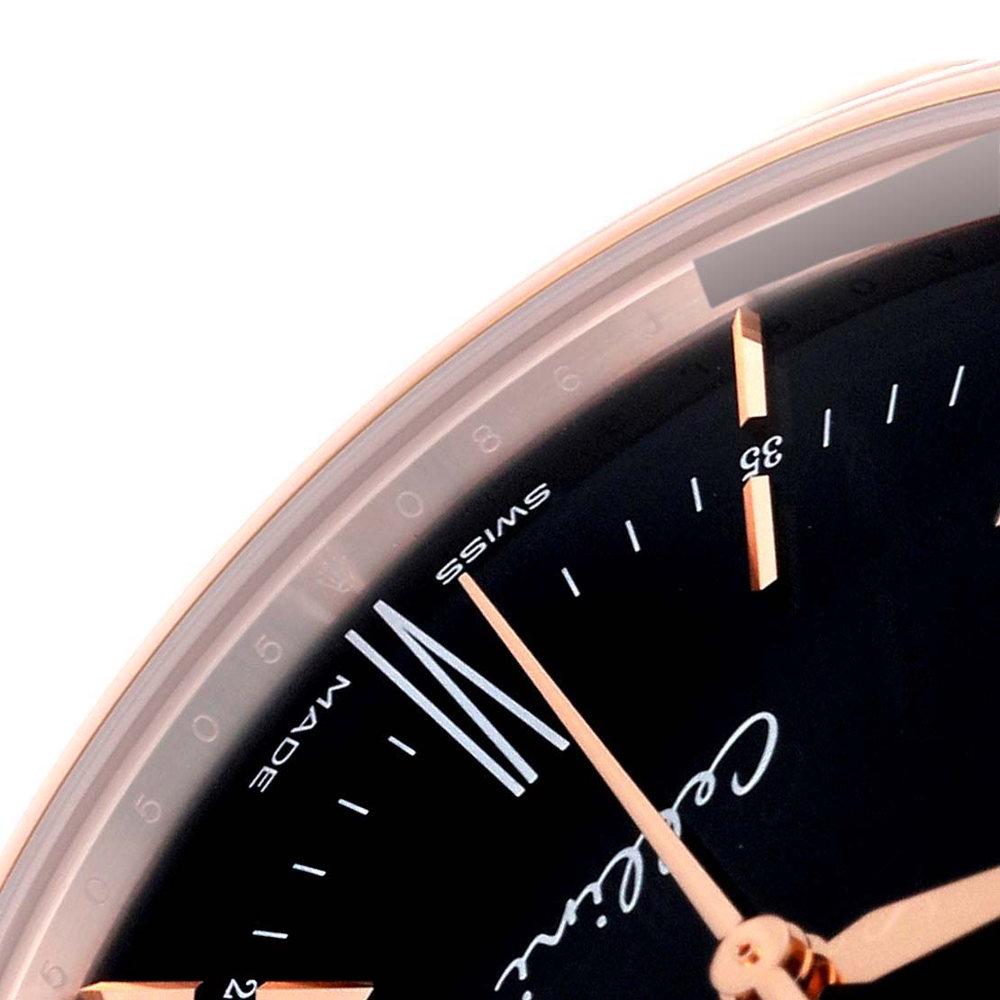 This close-up image of a Rolex Cellini 50505 Men's Rose Gold Black Dial 50505 Men's Rose Gold Black Dial model watch shows the partial dial, minute markers, and hands.