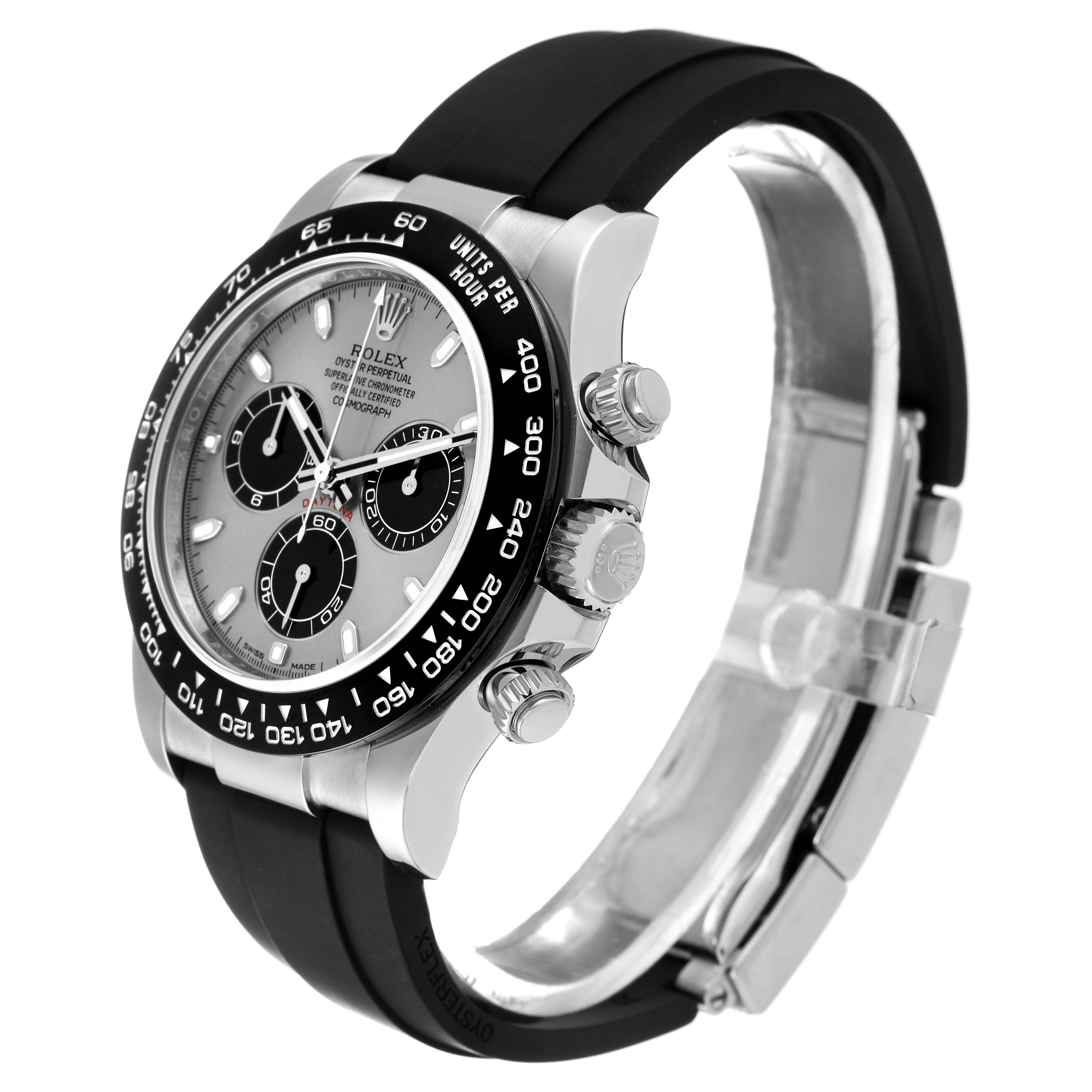 This image shows a side angle view of a Rolex Daytona 116519 Men's White Gold Grey Dial 116519 Men's White Gold Grey Dial watch, featuring its dial, bezel, crown, and rubber strap.