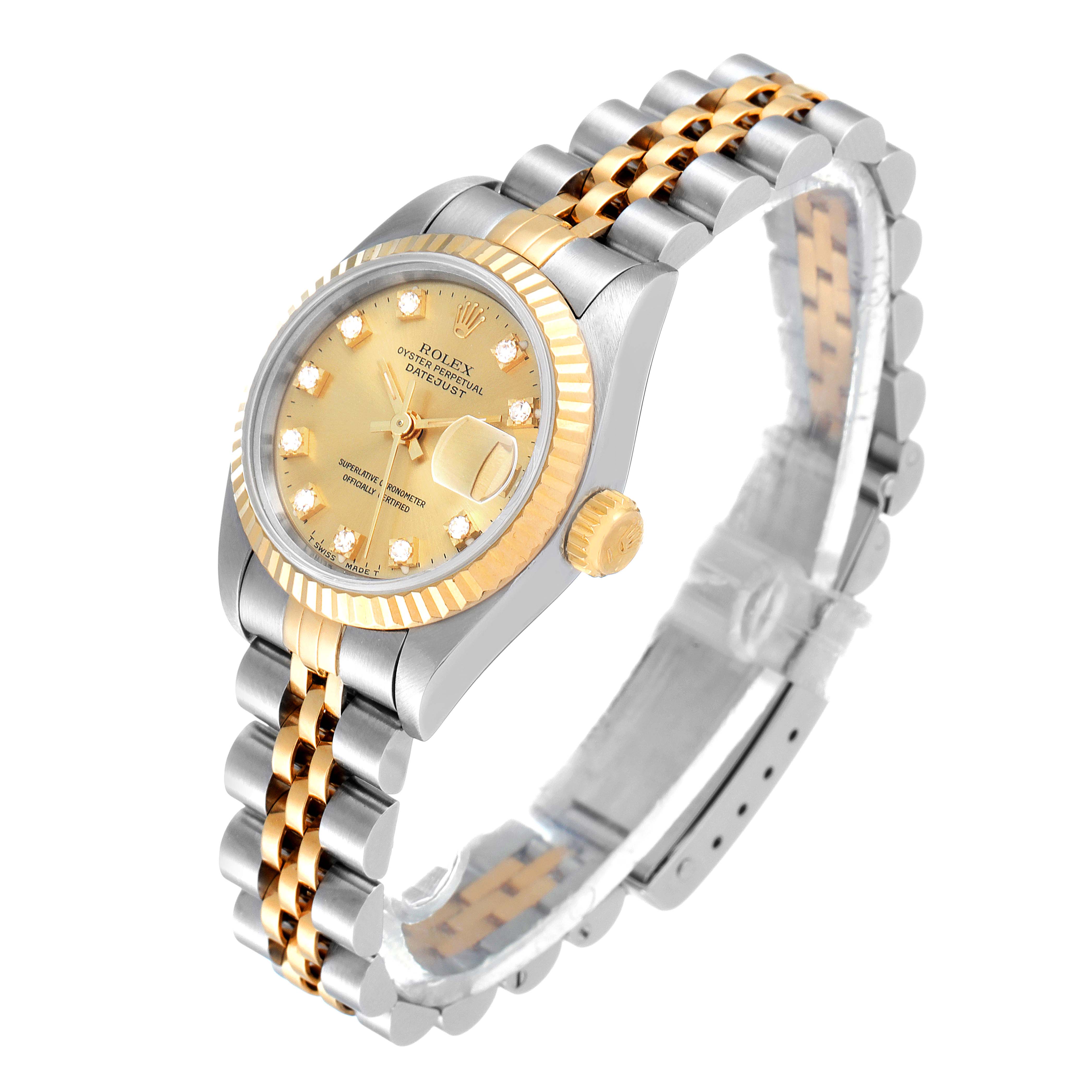 The image shows a Rolex Datejust 69173 Women
s Steel and Gold (two tone) Champagne Dial 69173 Women
s Steel and Gold (two tone) Champagne Dial watch at an angle, displaying the face, bezel, crown, and two-tone jubilee bracelet.
