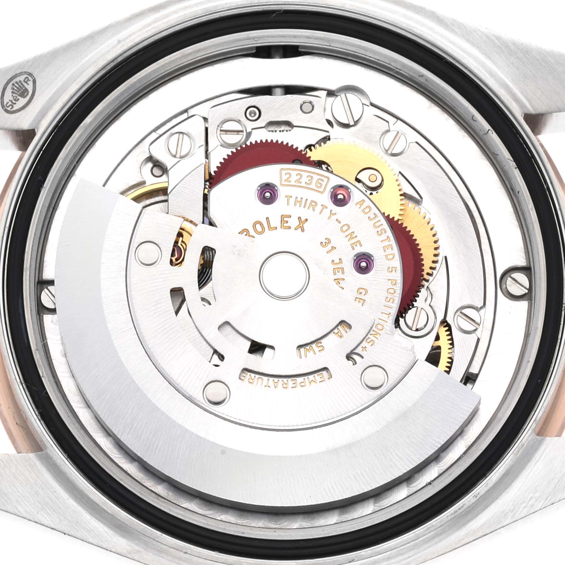The image shows the movement mechanism of a Rolex Mid-Size 278271 Women's Steel and Gold (two tone) Grey Dial 278271 Women's Steel and Gold (two tone) Grey Dial model watch viewed from the back casing angle.