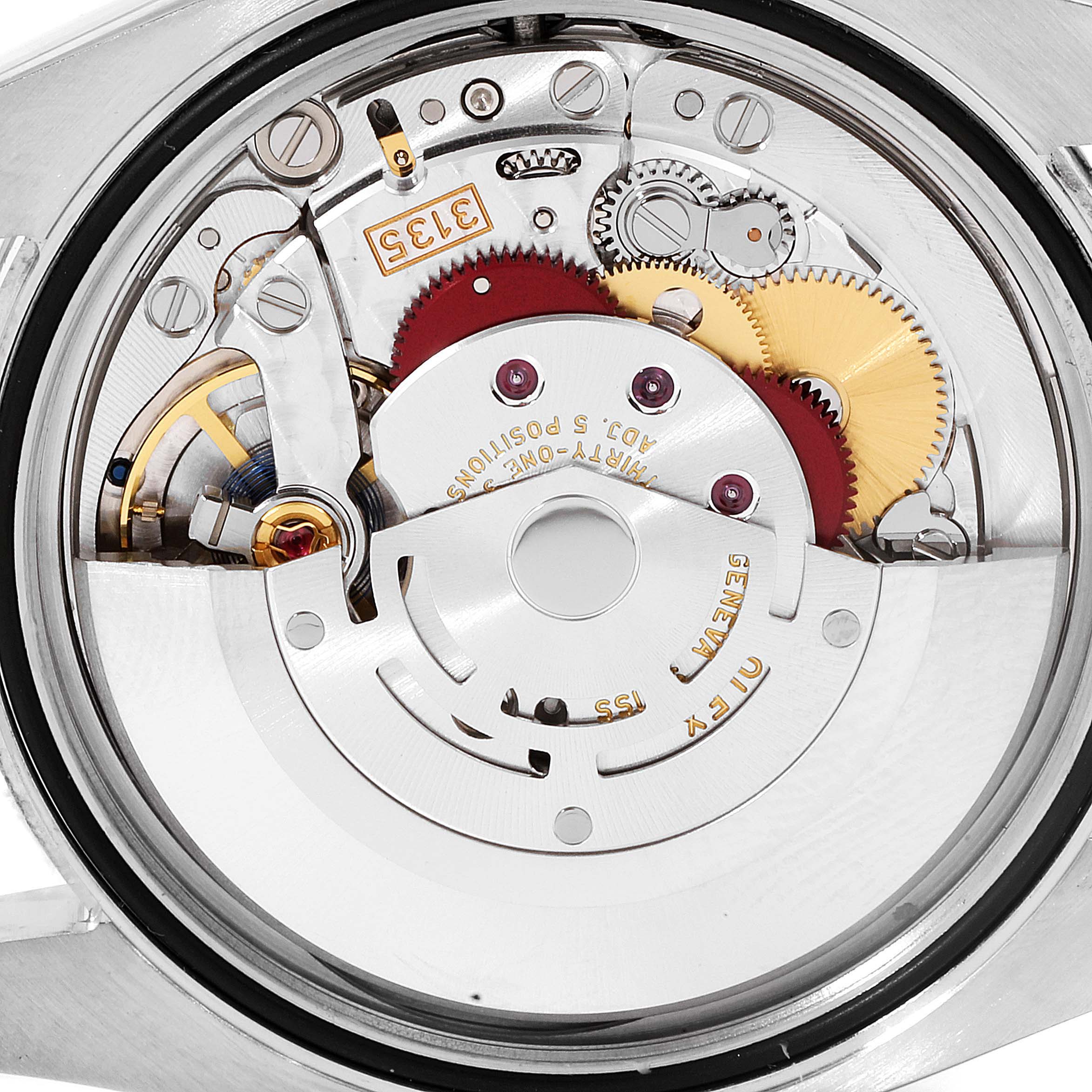 This image shows the internal mechanism of a Rolex Datejust 116231 Men's Steel and Gold (two tone) Black Dial 116231 Men's Steel and Gold (two tone) Black Dial watch from a back view.
