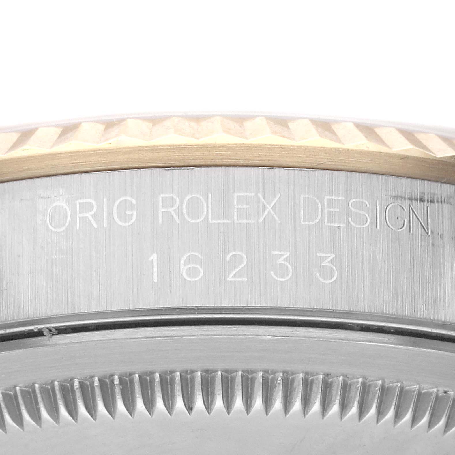 The image shows a close-up of the side and partially the back of a Rolex Datejust 16233 Men's Steel and Gold (two tone) Champagne Dial 16233 Men's Steel and Gold (two tone) Champagne Dial watch, displaying the model number 16233.