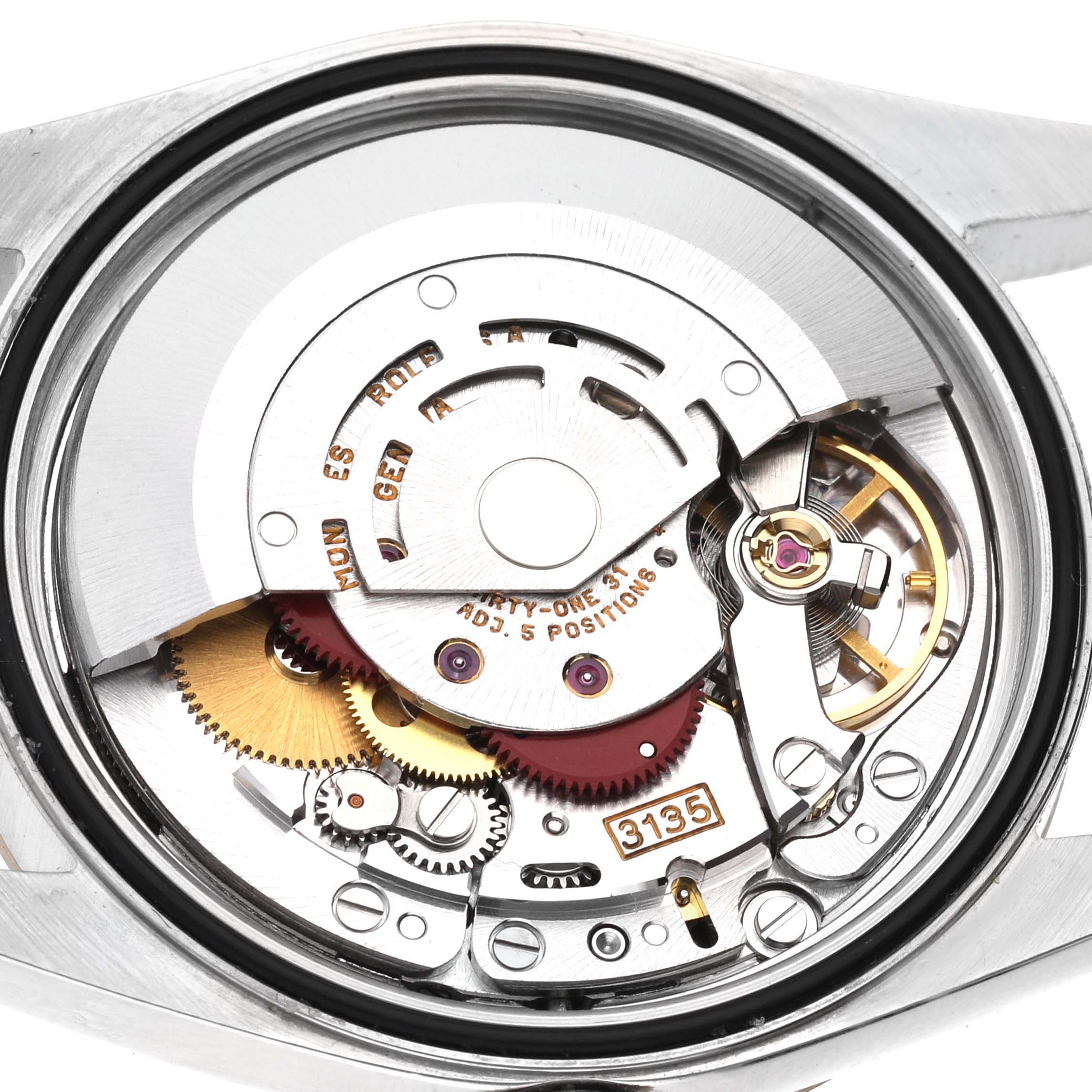 The image shows the internal mechanism and movement of the Rolex Datejust 16233 Men's Steel and Gold (two tone) Champagne Dial 16233 Men's Steel and Gold (two tone) Champagne Dial watch from a close-up angle.