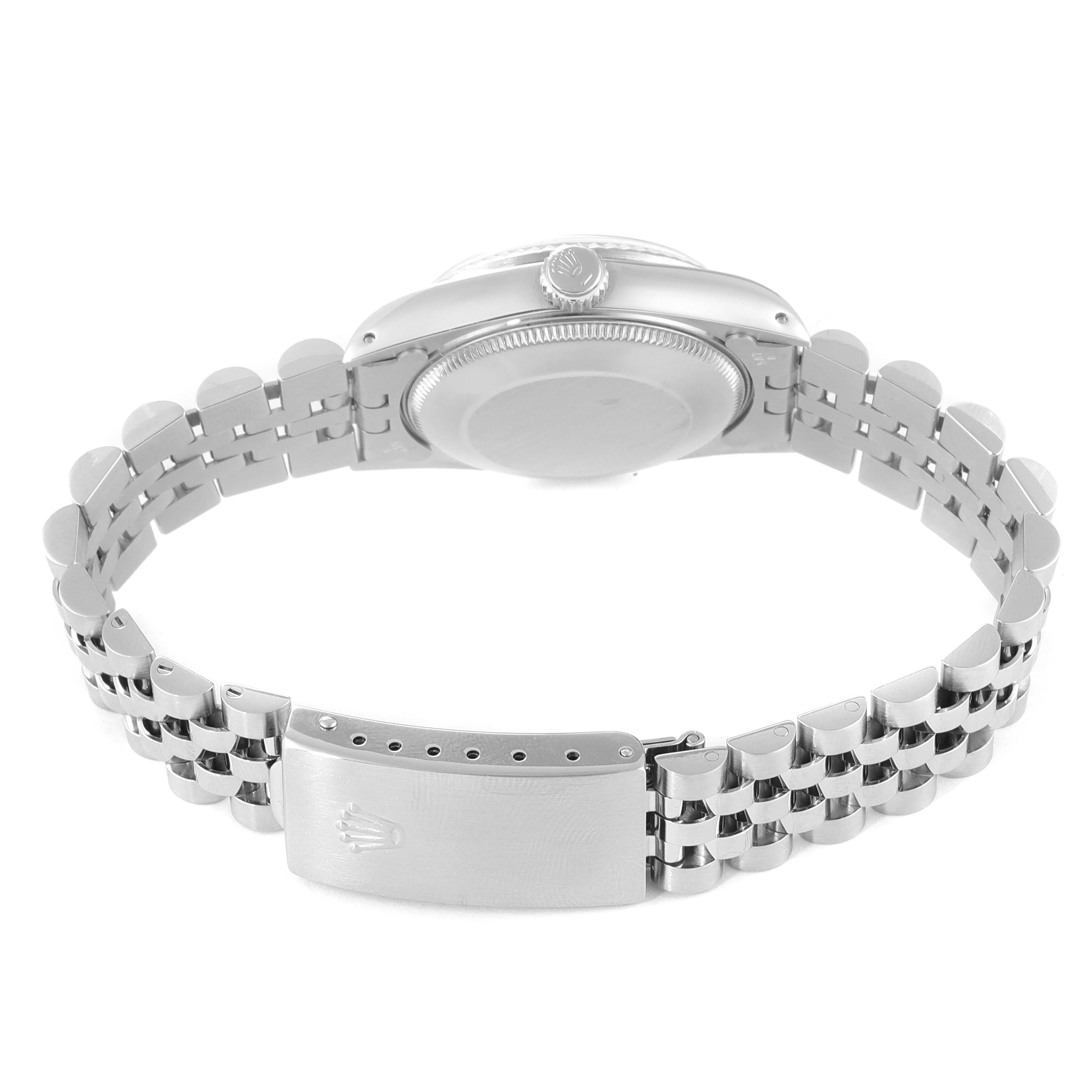 The image shows the underside and clasp of a Rolex Mid-Size 68274 Women
s Stainless Steel White Dial 68274 Women
s Stainless Steel White Dial watch, with the bracelet open and the caseback visible.