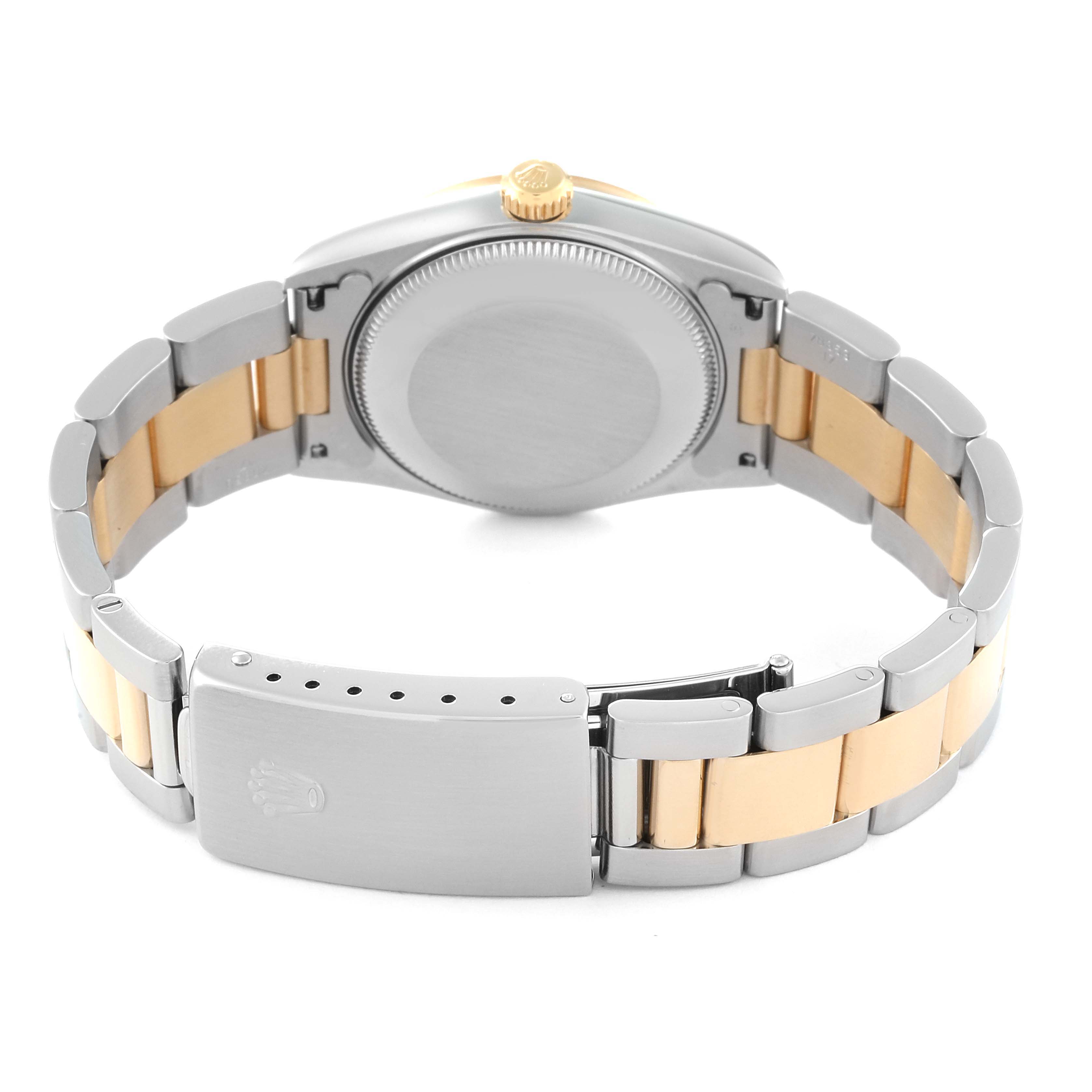 The image shows the back view of a Rolex Mid-Size 78243 Women's Steel and Gold (two tone) Mother of Pearl Dial 78243 Women's Steel and Gold (two tone) Mother of Pearl Dial model watch including the stainless steel and gold bracelet and clasp.