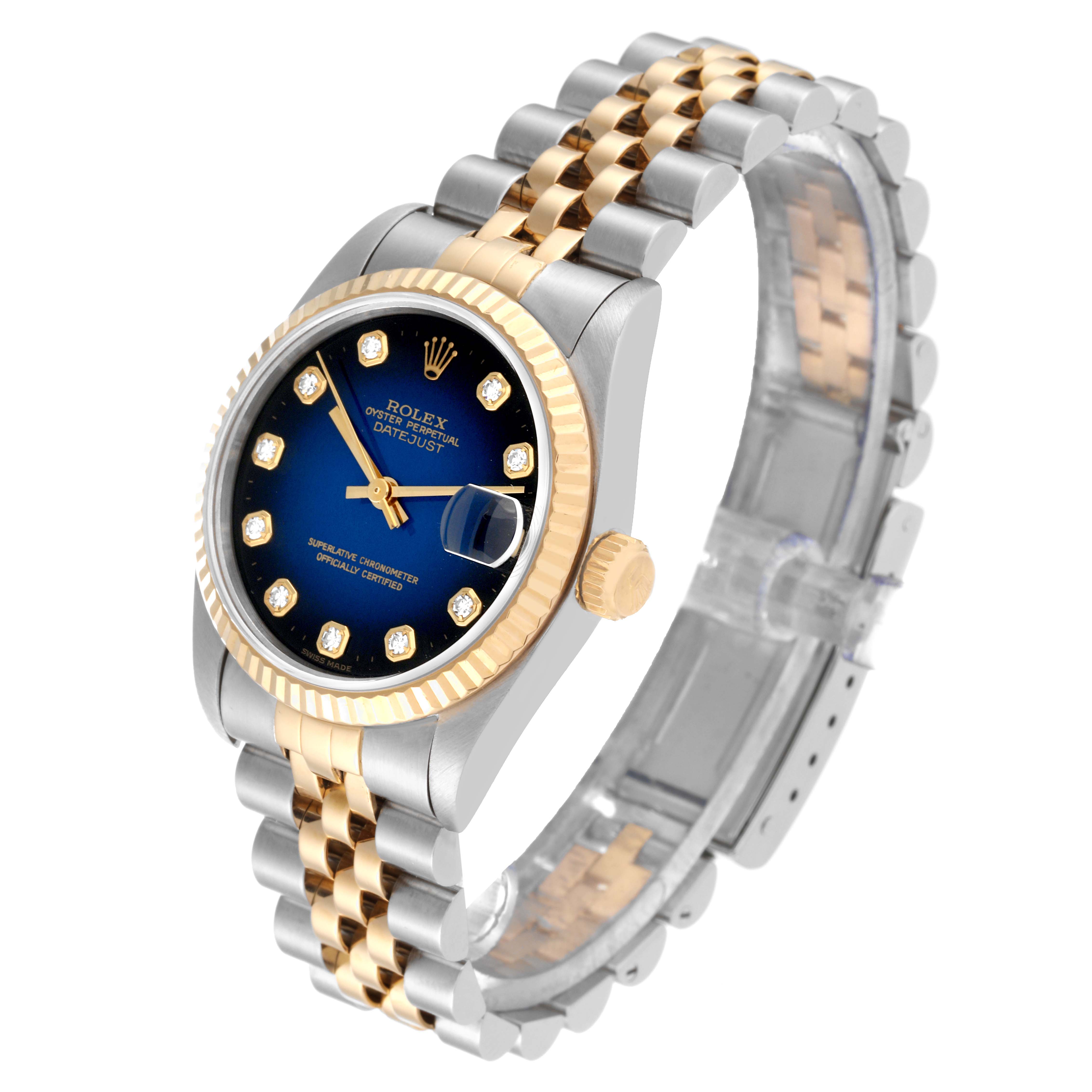 This image shows a Rolex Mid-Size 68273 Women's Steel and Gold (two tone) Blue Dial 68273 Women's Steel and Gold (two tone) Blue Dial Datejust watch from a slightly angled front view, displaying the dial, bezel, crown, and bracelet.