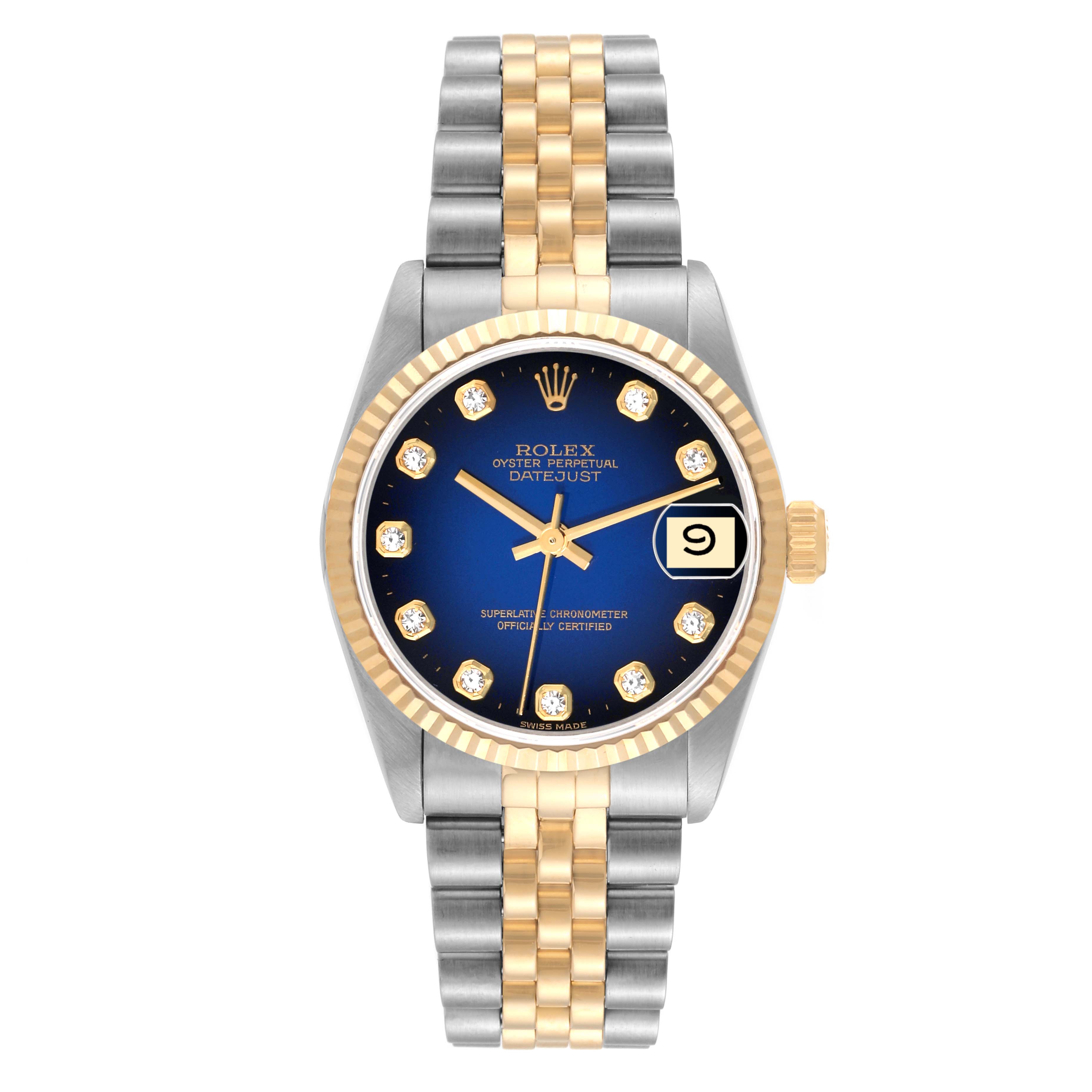 This image shows a frontal view of the Rolex Mid-Size 68273 Women's Steel and Gold (two tone) Blue Dial 68273 Women's Steel and Gold (two tone) Blue Dial Datejust watch, displaying its dial, bezel, and two-tone bracelet.