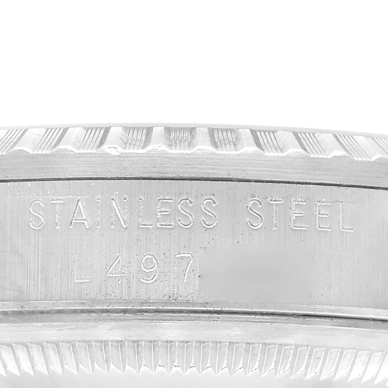 This image shows a close-up of the stainless steel engraved caseback of a Rolex Datejust 16220 Men's Stainless Steel Silver Dial 16220 Men's Stainless Steel Silver Dial watch.