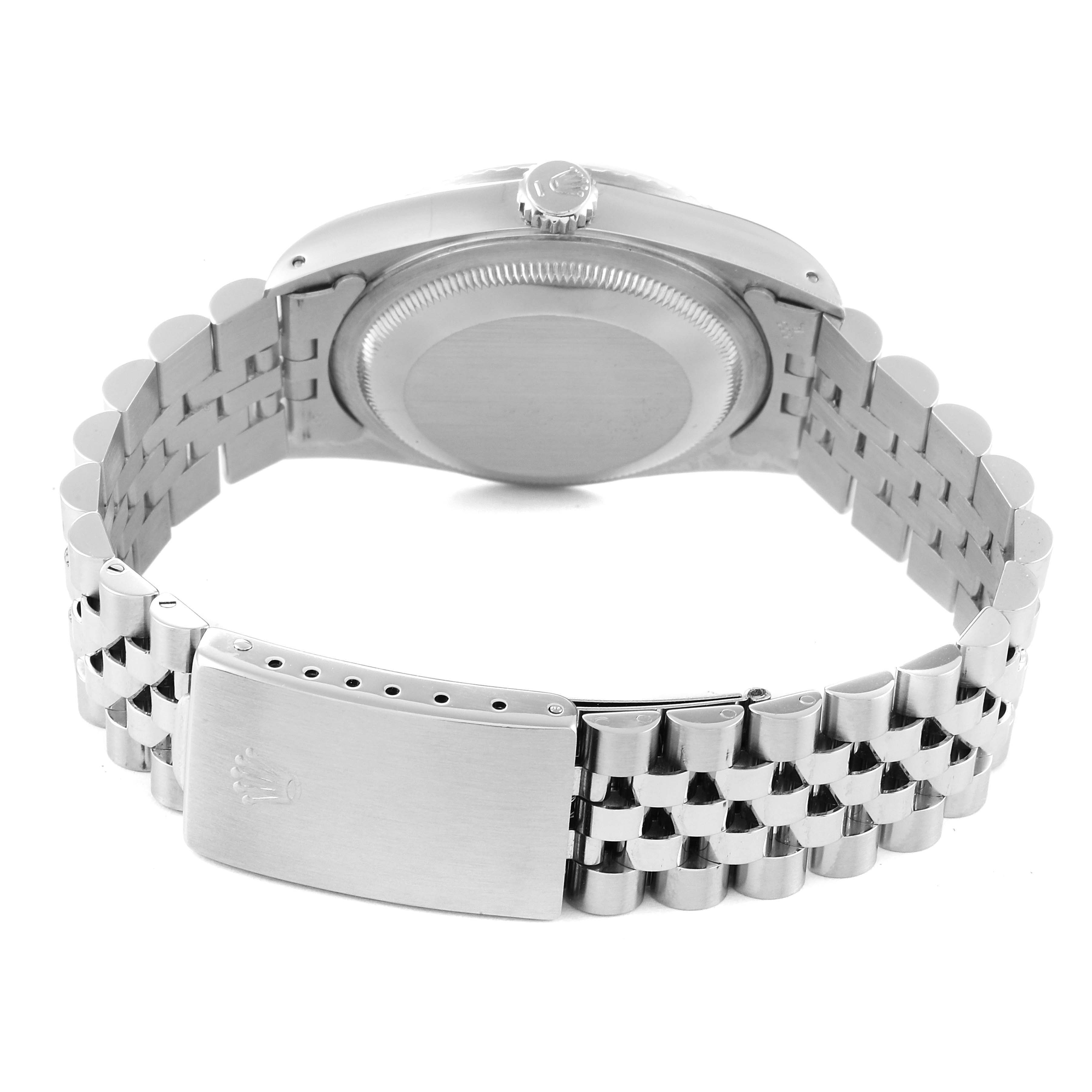 The image shows the back view of a Rolex Datejust 16220 Men's Stainless Steel Silver Dial 16220 Men's Stainless Steel Silver Dial watch, highlighting the case back, crown, and metal bracelet with clasp.