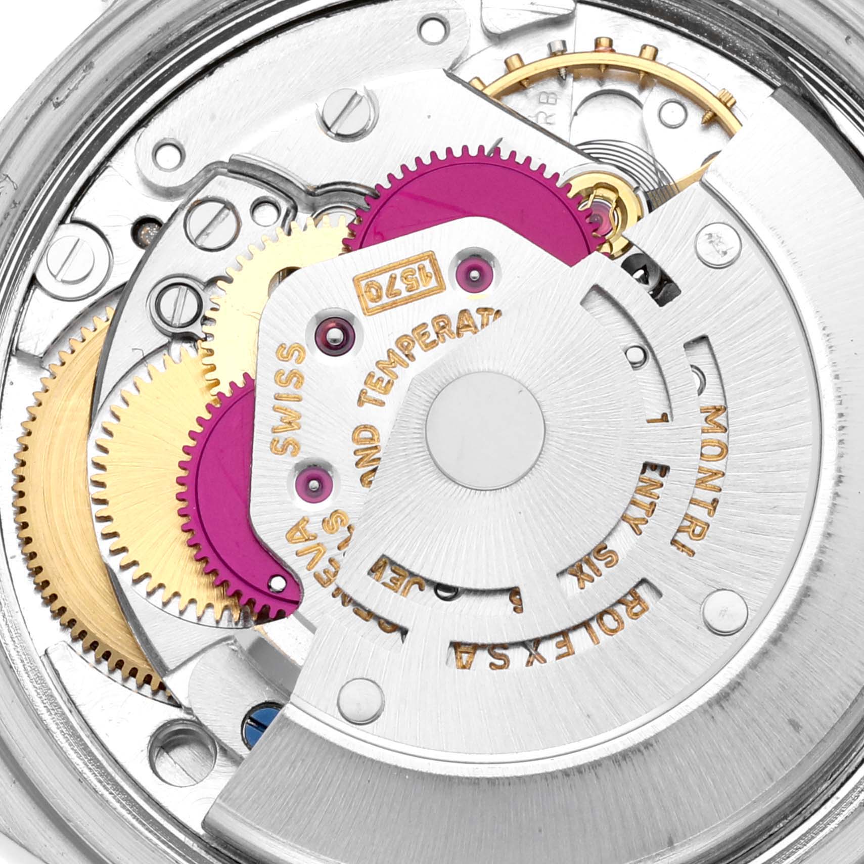 The image shows a close-up of the inner mechanical movement of a Vintage Collection Rolex watch.