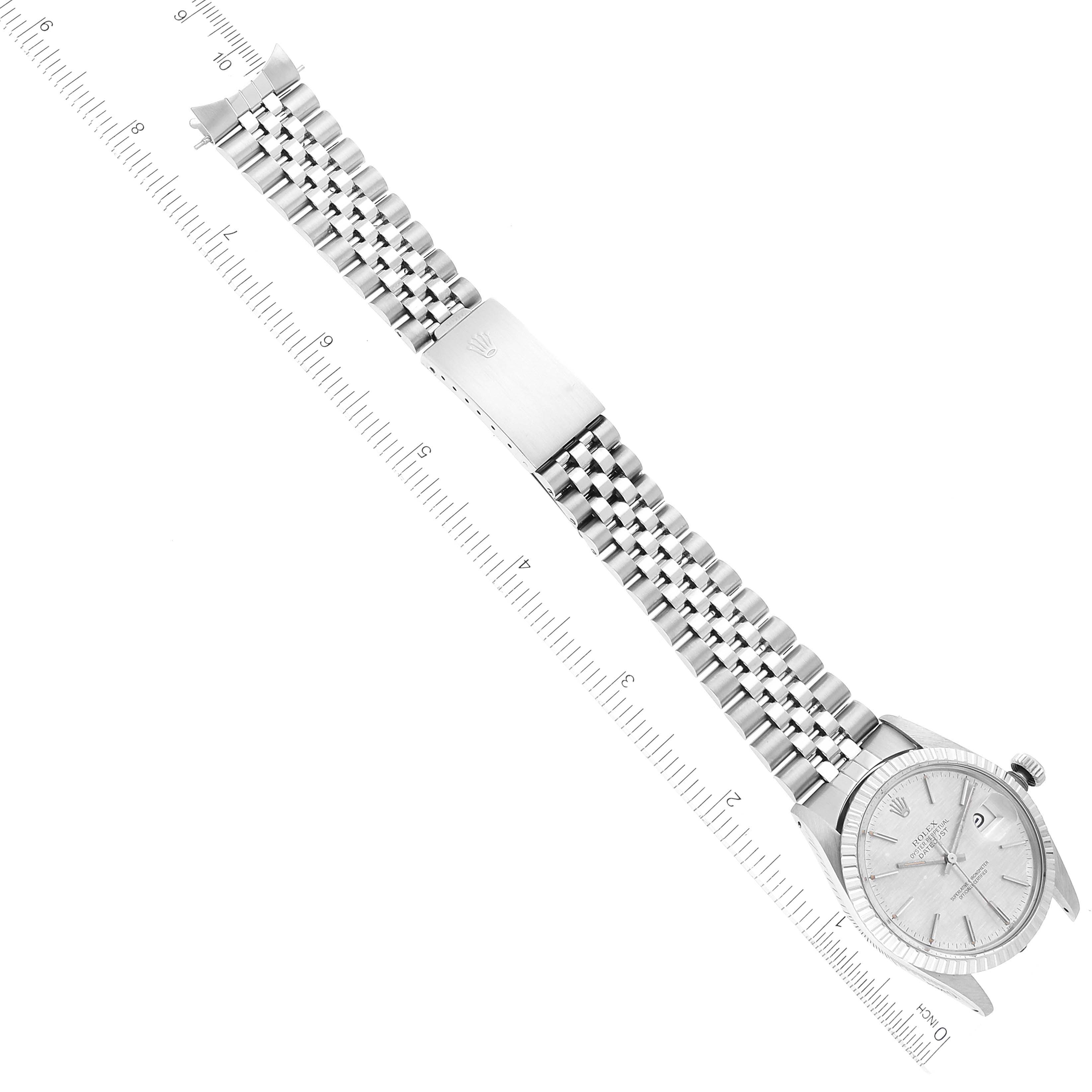 The Rolex Vintage Collection 16030 Men
s Stainless Steel Silver Dial 16030 Men
s Stainless Steel Silver Dial model watch is shown laid flat, focusing on the bracelet and face from a top-down angle.