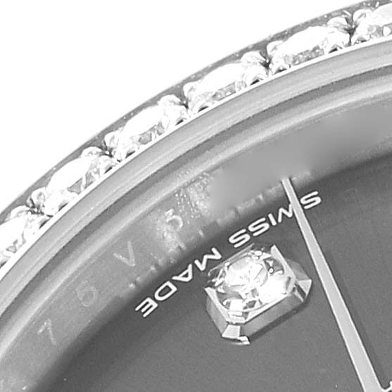 The image shows a close-up of the dial with a diamond marker and the edge of the bezel of a Rolex Datejust 279384 Women's Stainless Steel Grey Dial 279384 Women's Stainless Steel Grey Dial watch.