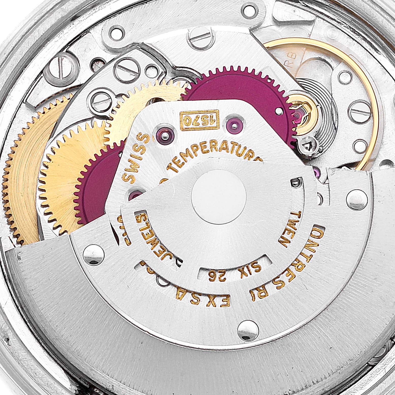 This close-up image shows the inner mechanical movement of a Rolex Datejust 1601 Men's Stainless Steel Silver Dial 1601 Men's Stainless Steel Silver Dial watch, highlighting gears and components.