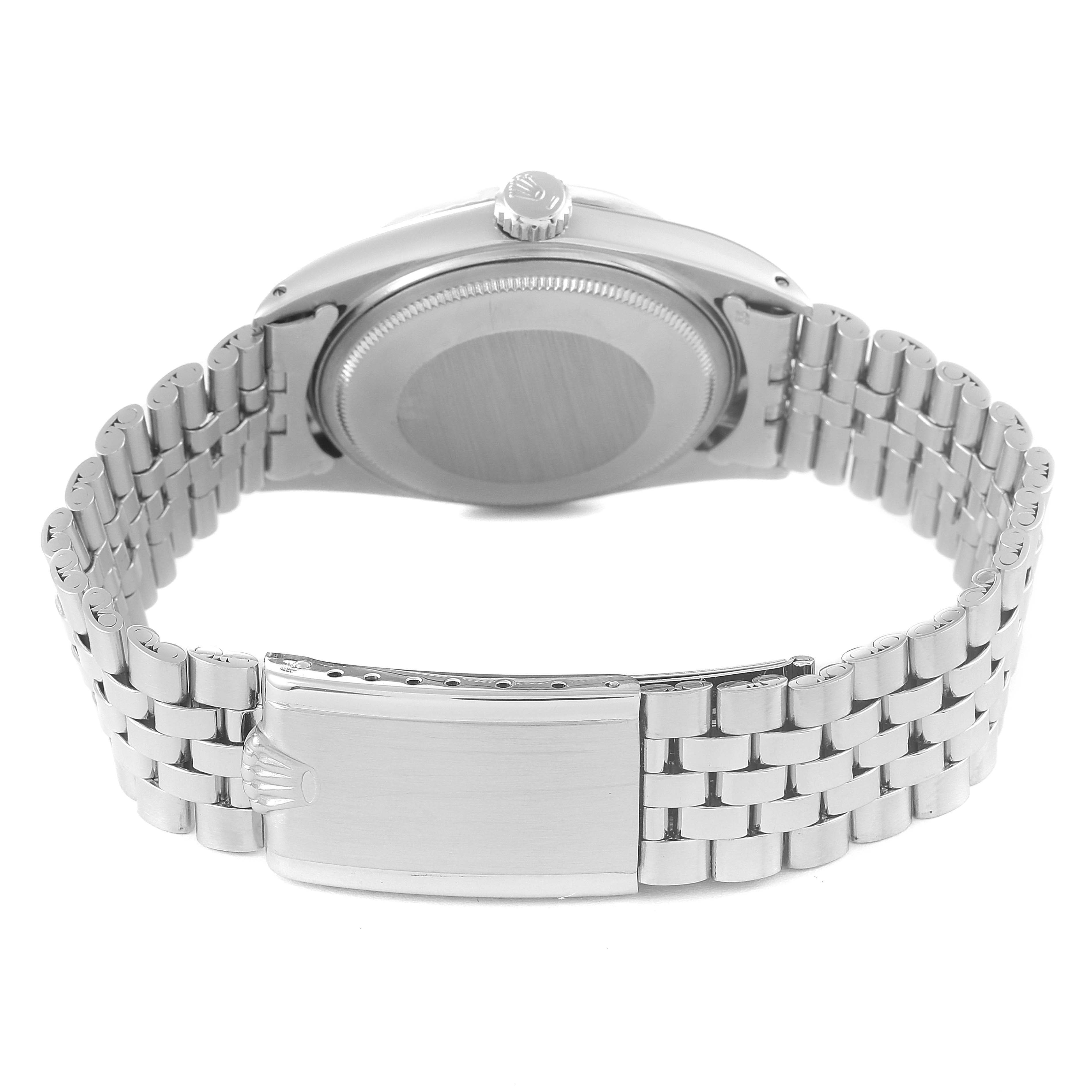 The image shows the back view of a Rolex Datejust 1601 Men's Stainless Steel Silver Dial 1601 Men's Stainless Steel Silver Dial watch, highlighting the case back, crown, and bracelet clasp.