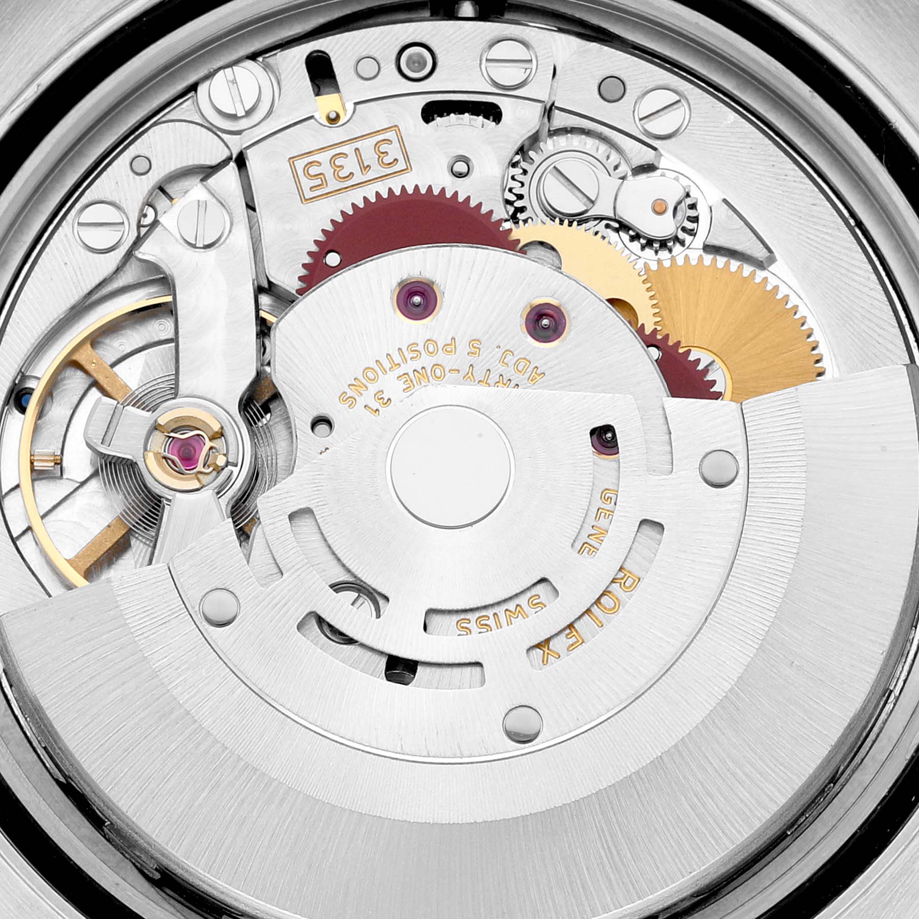 This is a close-up of the inner mechanical movement of a Rolex Datejust 116233 Men's Steel and Gold (two tone) Blue Dial 116233 Men's Steel and Gold (two tone) Blue Dial watch, showing gears and intricate components.