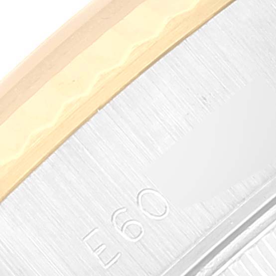 The image shows a close-up of the bezel and case side of a Rolex Datejust 69173 Women's Steel and Gold (two tone) Champagne Dial 69173 Women's Steel and Gold (two tone) Champagne Dial watch.