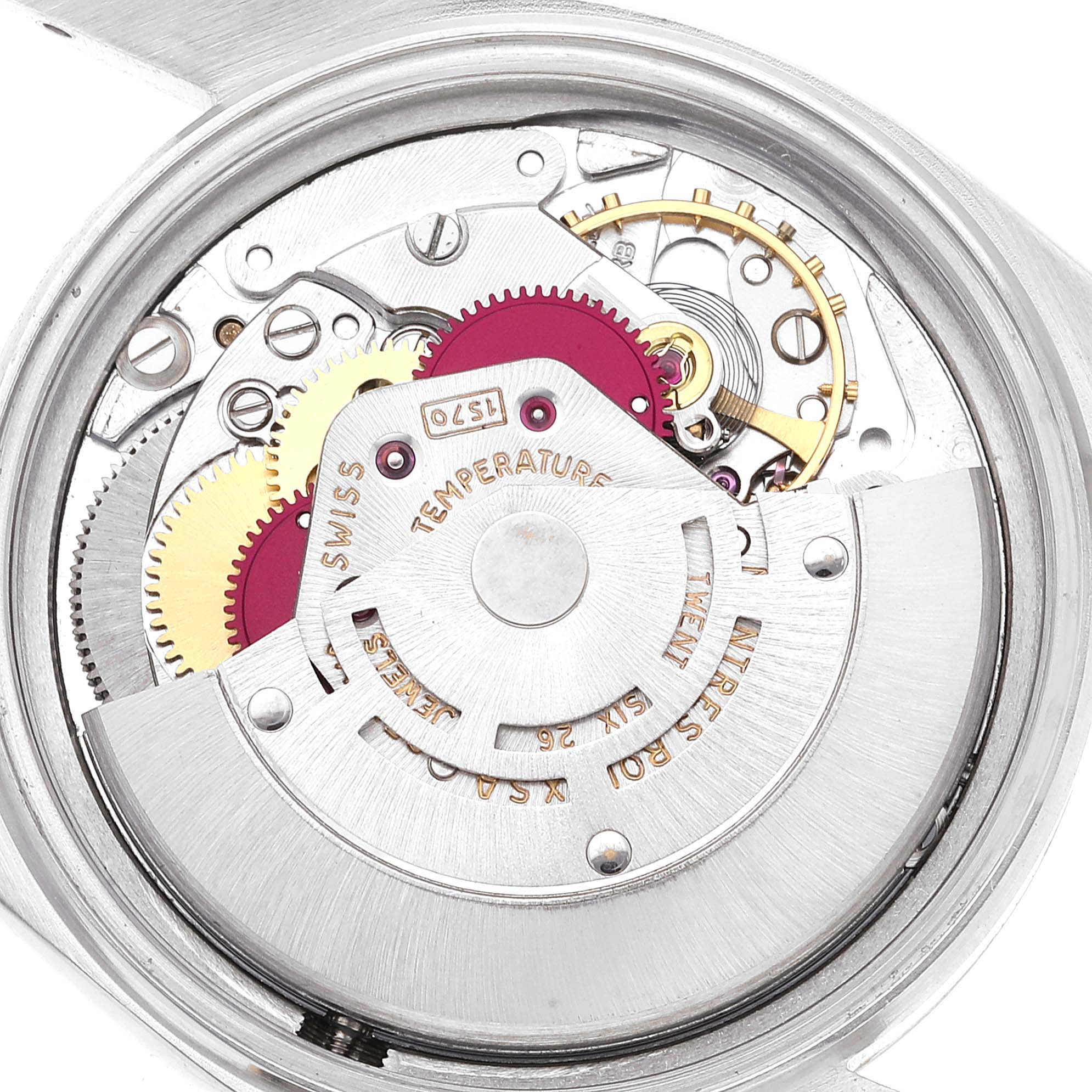 This image shows a close-up view of the movement inside a Rolex Datejust 1601 Men's Steel and Gold (two tone) Champagne Dial 1601 Men's Steel and Gold (two tone) Champagne Dial watch.