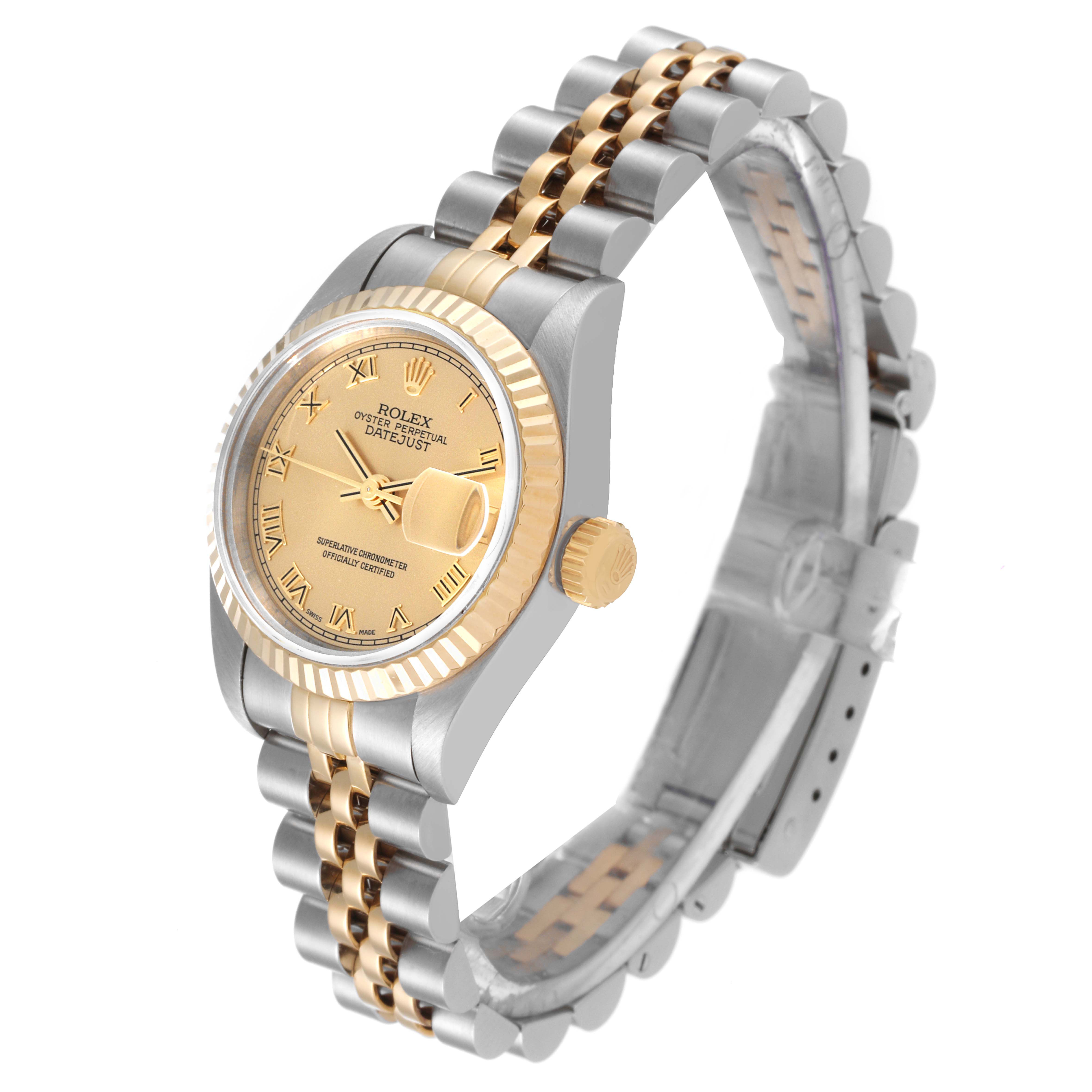 The image shows a Rolex Datejust 69173 Women's Steel and Gold (two tone) Champagne Dial 69173 Women's Steel and Gold (two tone) Champagne Dial watch at an angled side view, displaying the face, crown, and two-tone bracelet.