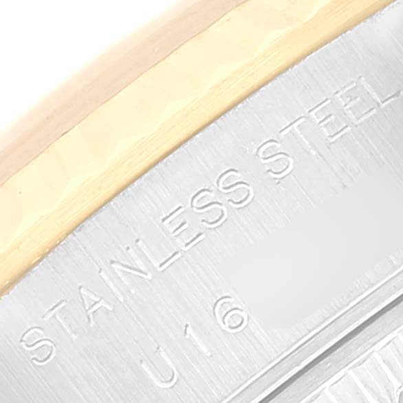 This image shows a close-up of the stainless steel and gold bezel section of a Rolex Datejust 69173 Women's Steel and Gold (two tone) Champagne Dial 69173 Women's Steel and Gold (two tone) Champagne Dial watch.