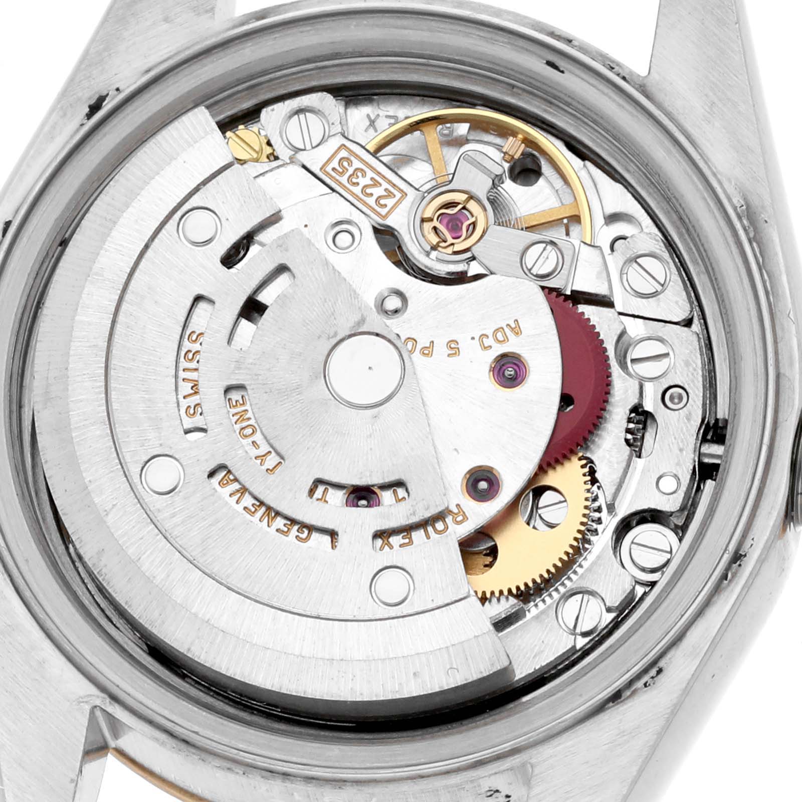 The image shows an internal view of a Rolex Datejust 79173 Women's Steel and Gold (two tone) Champagne Dial 79173 Women's Steel and Gold (two tone) Champagne Dial watch, highlighting its movement and mechanical components.