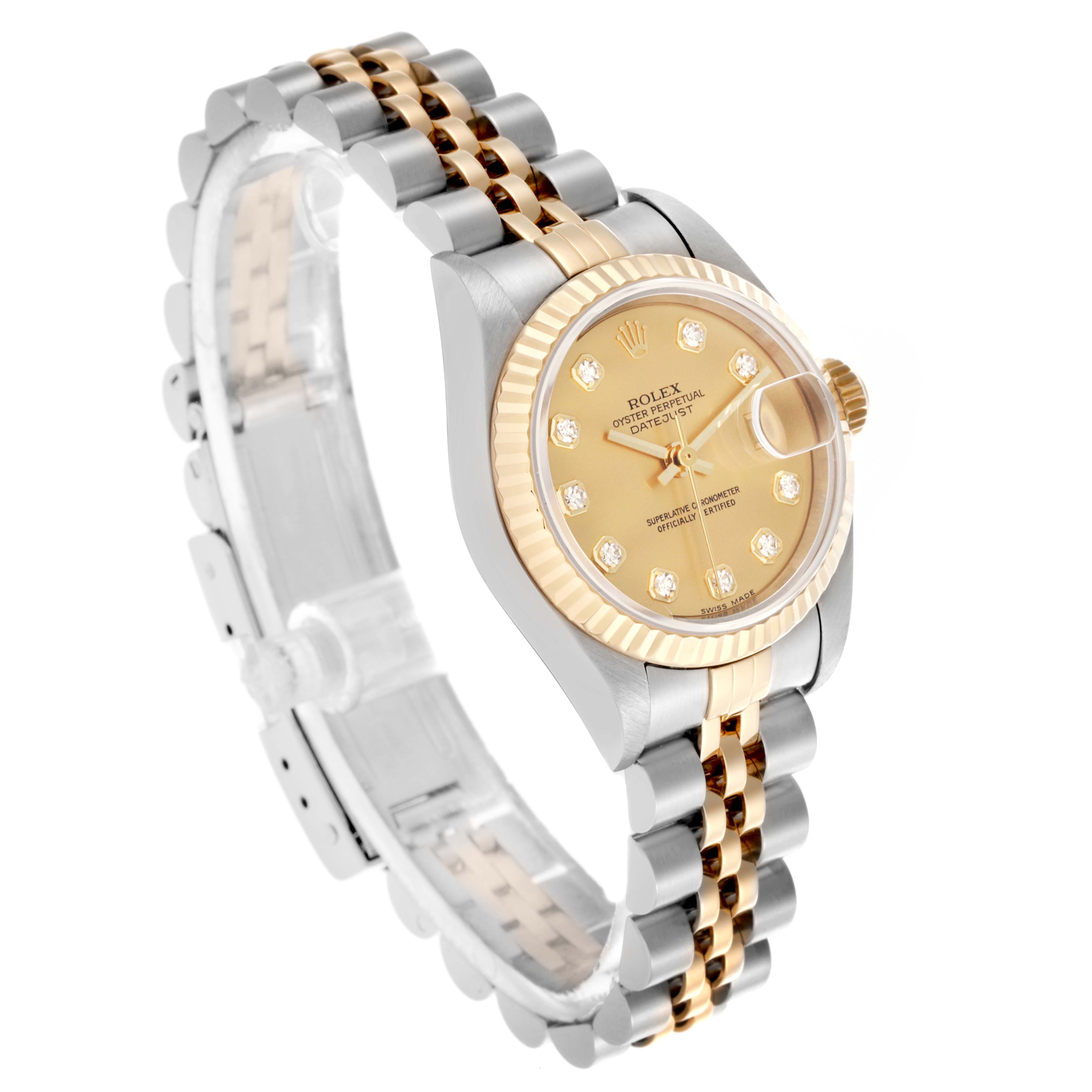 The Rolex Datejust 79173 Women's Steel and Gold (two tone) Champagne Dial 79173 Women's Steel and Gold (two tone) Champagne Dial watch is shown at an angled side view, highlighting the bezel, face, and two-tone bracelet.