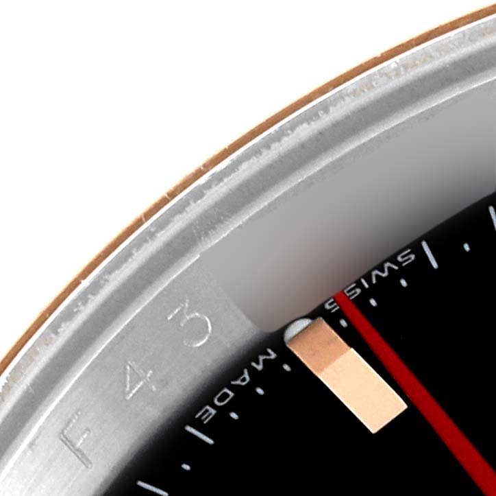 The image shows a close-up of the dial and bezel of the Rolex Turn-o-Graph 116261 Men's Steel and Gold (two tone) Black Dial 116261 Men's Steel and Gold (two tone) Black Dial watch.