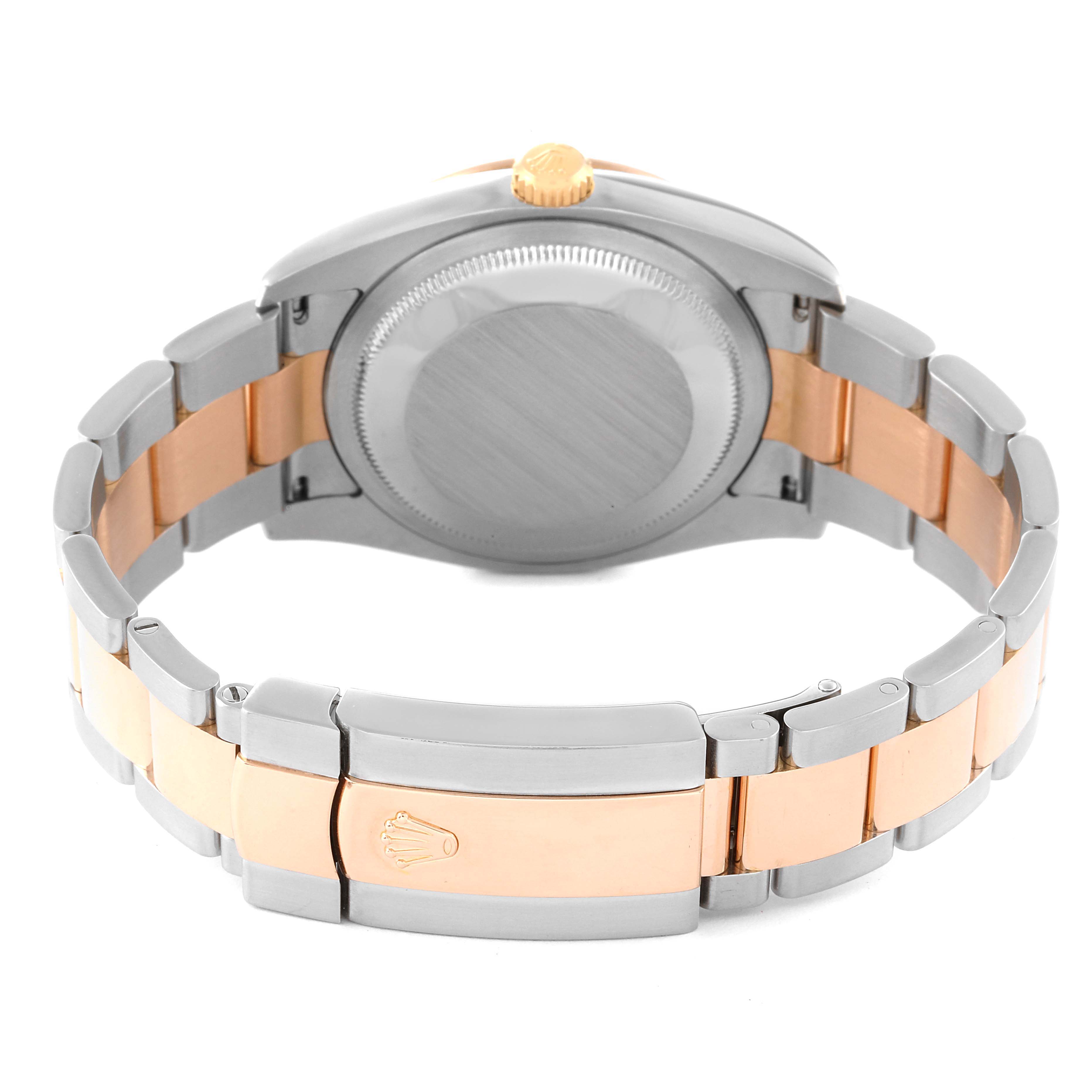 The image shows the backside and clasp of a Rolex Turn-o-Graph 116261 Men's Steel and Gold (two tone) Black Dial 116261 Men's Steel and Gold (two tone) Black Dial watch.