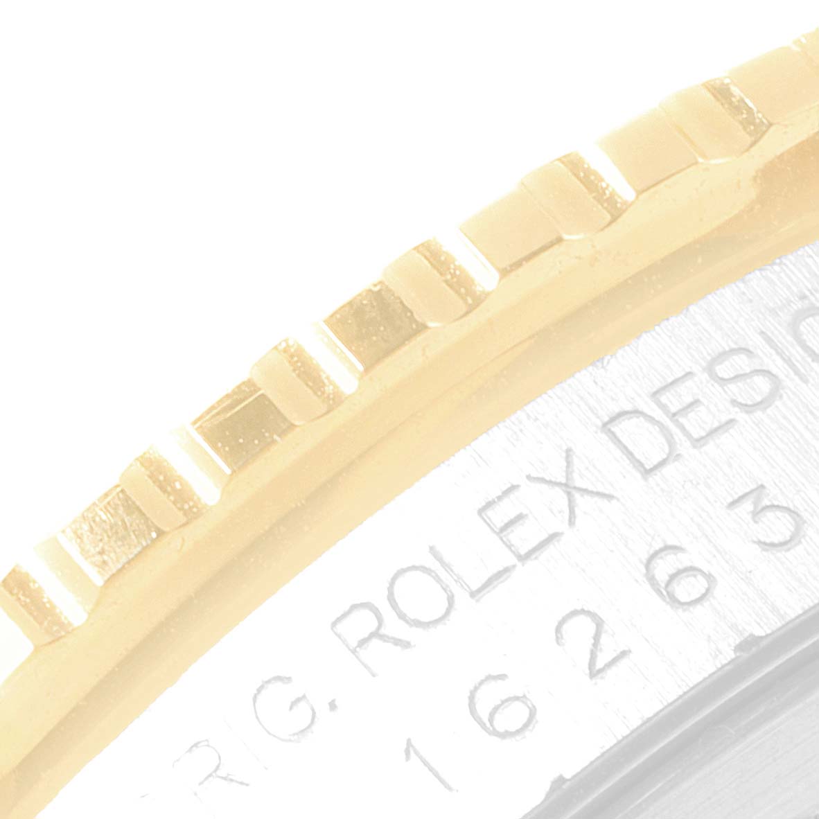 This image shows a partial view of the bezel and serial number engraving of the Rolex Turn-o-Graph 16263 Men
s Steel and Gold (two tone) White Dial 16263 Men
s Steel and Gold (two tone) White Dial watch.