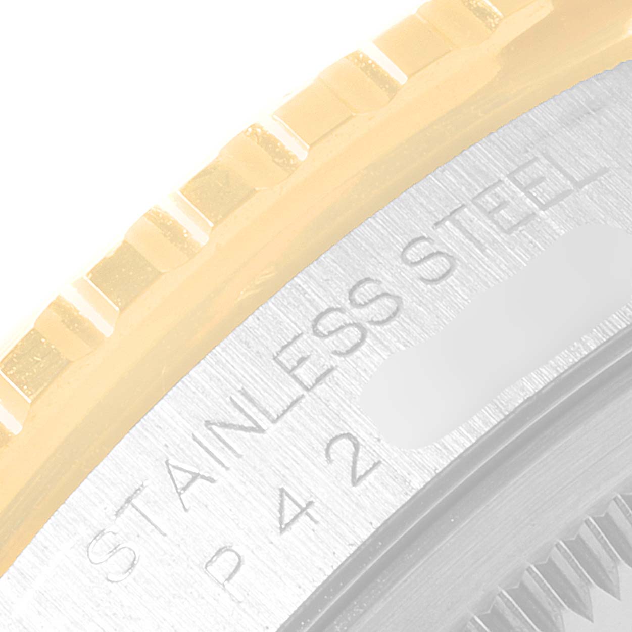 The close-up angle shows part of the bezel and the engraved text on the case back of the Rolex Turn-o-Graph 16263 Men
s Steel and Gold (two tone) White Dial 16263 Men
s Steel and Gold (two tone) White Dial model.