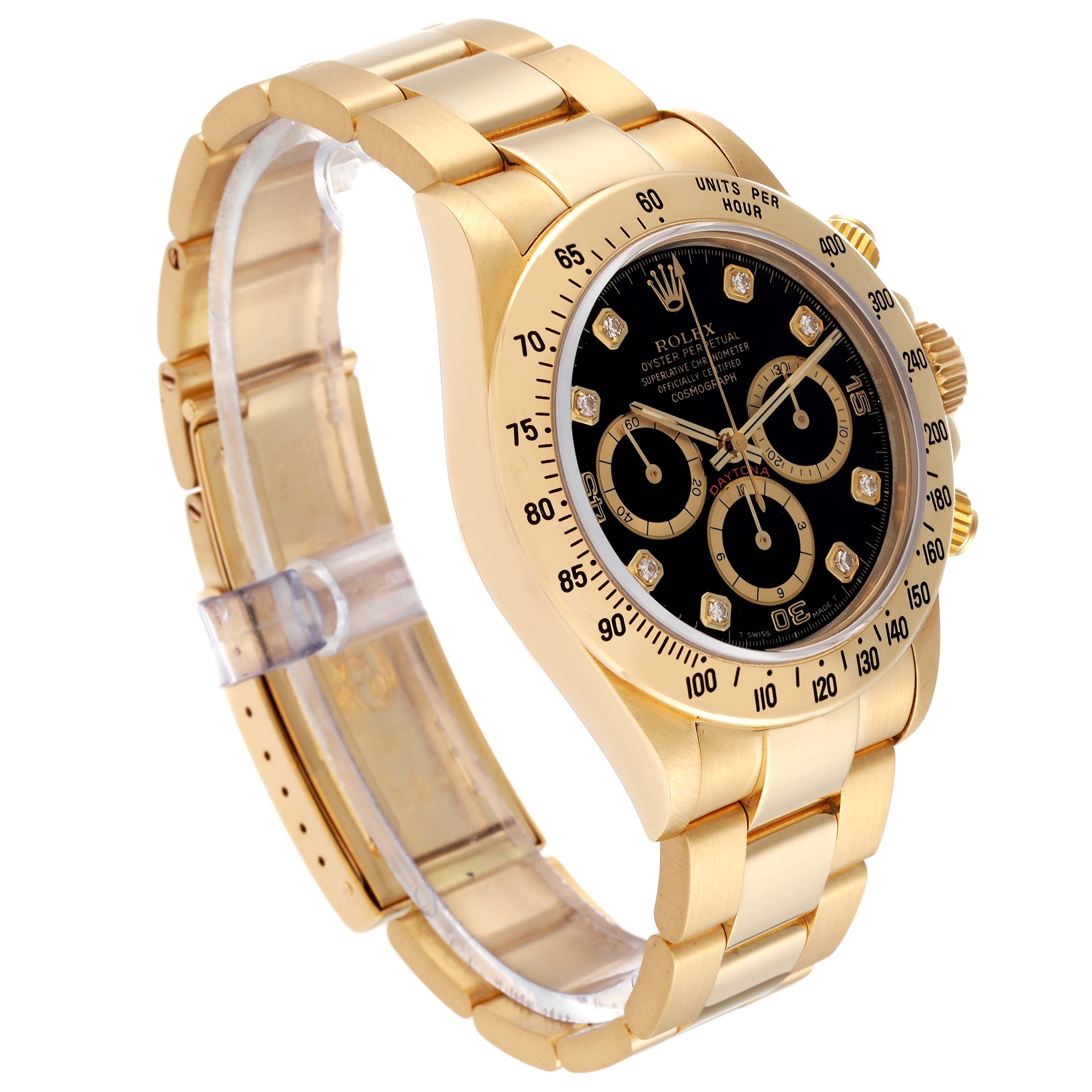 The image shows a side angle of the Rolex Daytona 16528G Men's Yellow Gold Black Dial 16528G Men's Yellow Gold Black Dial watch highlighting its bracelet, bezel, dial, and subdials.