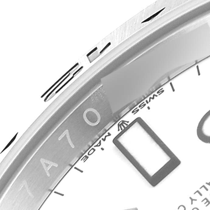 This image shows a close-up of the dial and bezel
s edge of a Rolex Explorer 226570 Men
s Stainless Steel White Dial 226570 Men
s Stainless Steel White Dial watch.