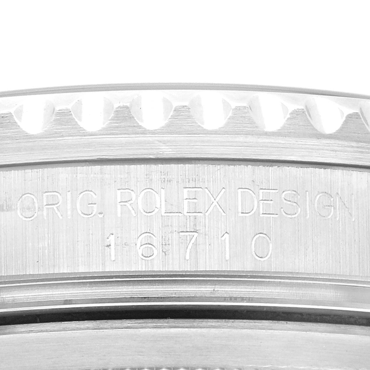 This image shows a close-up of the engravings on the case side of a Rolex GMT-Master 16710 Men's Stainless Steel Black Dial 16710 Men's Stainless Steel Black Dial model watch.