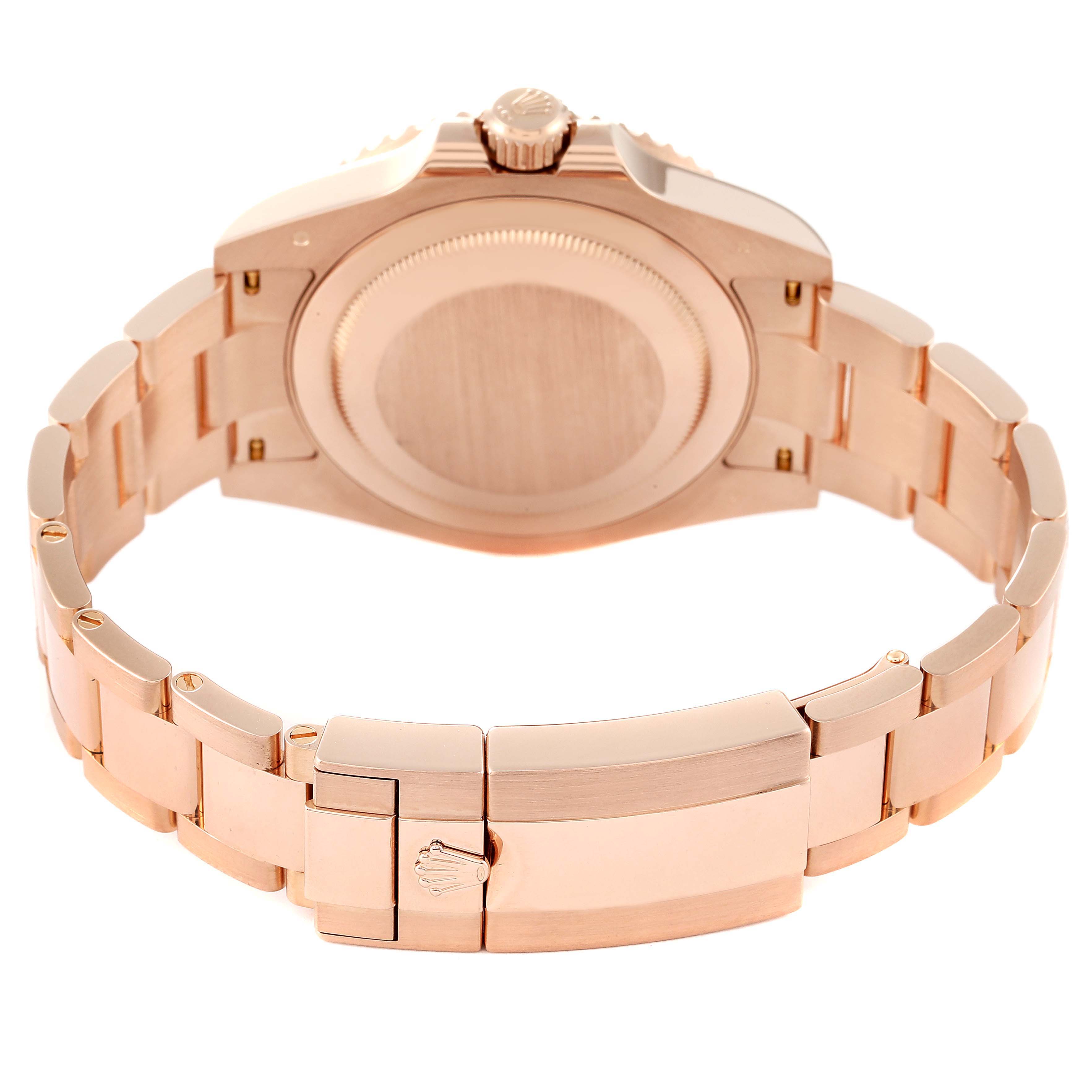 This image shows the rear view of a Rolex GMT-Master 126715 Men's Rose Gold Black Dial 126715 Men's Rose Gold Black Dial watch, highlighting its bracelet and clasp.